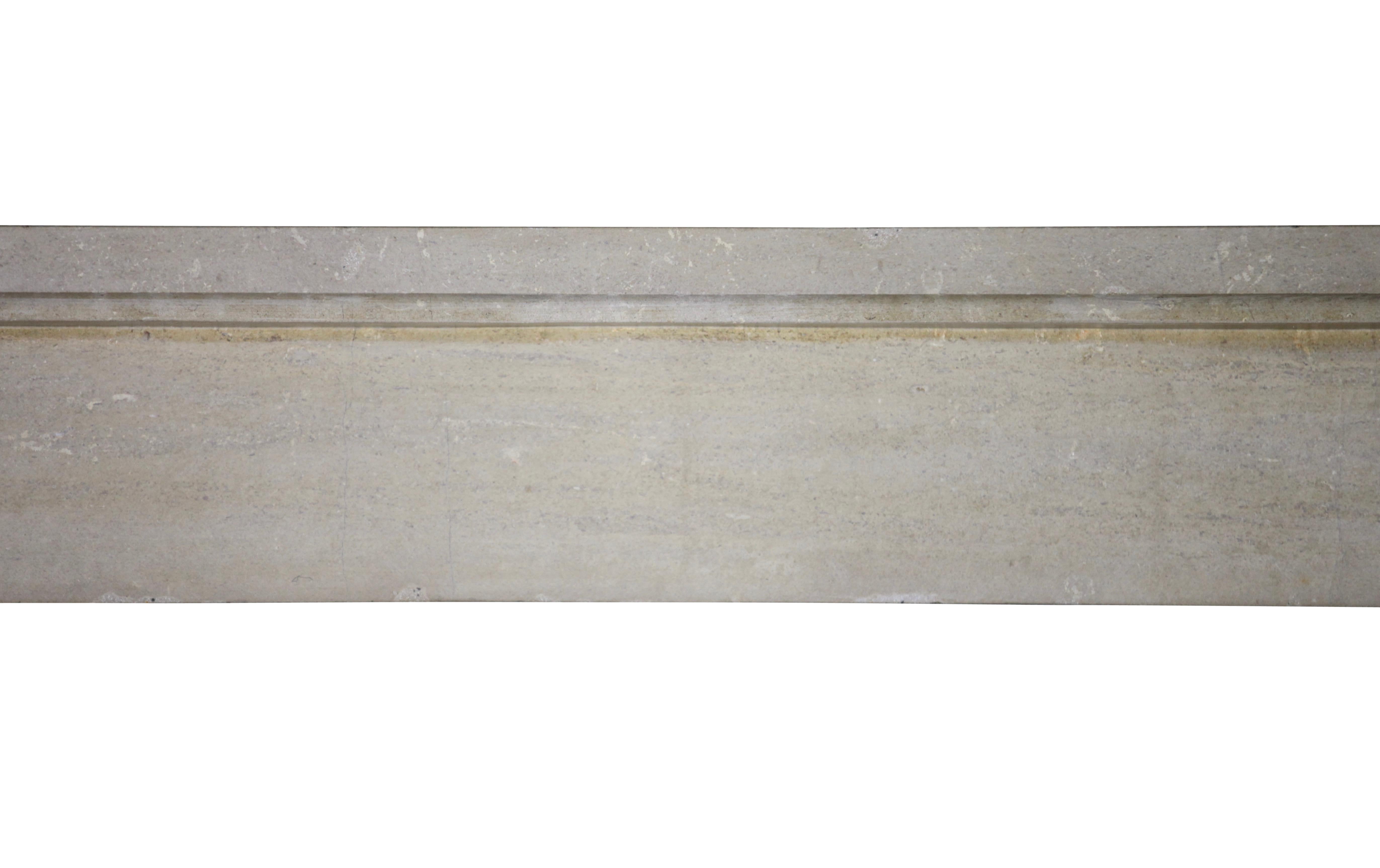 This French fine original antique fireplace surround from the 19th century in a hard limestone. The stone reflects the light of the room. It has a very smooth and rather clean surface. A real petite Bourguignone.
Measures;
146 cm EW 57.48