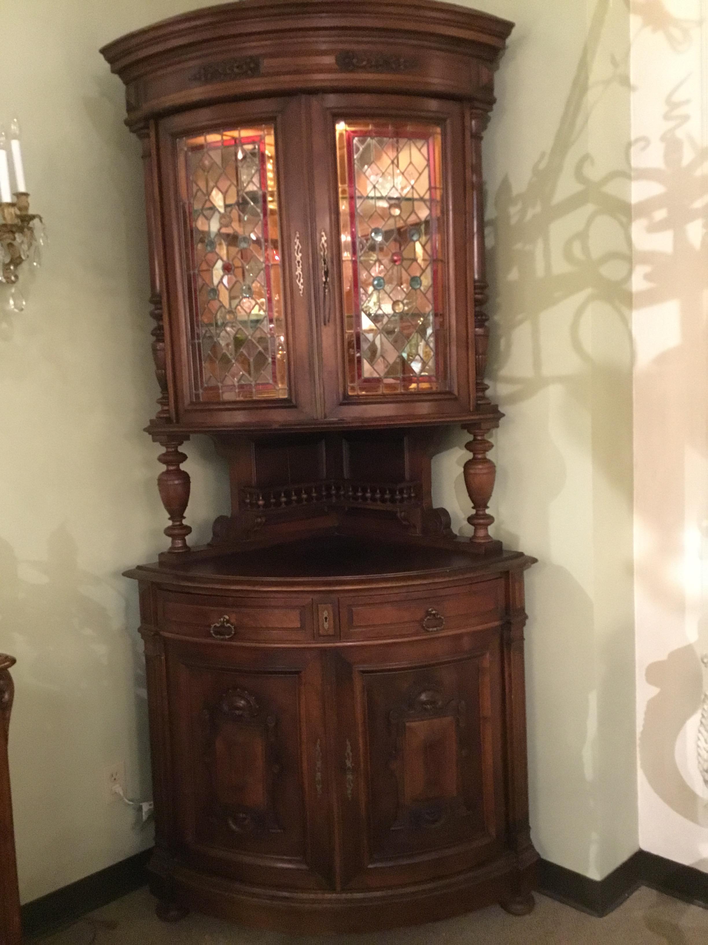 antique corner cabinet with glass doors