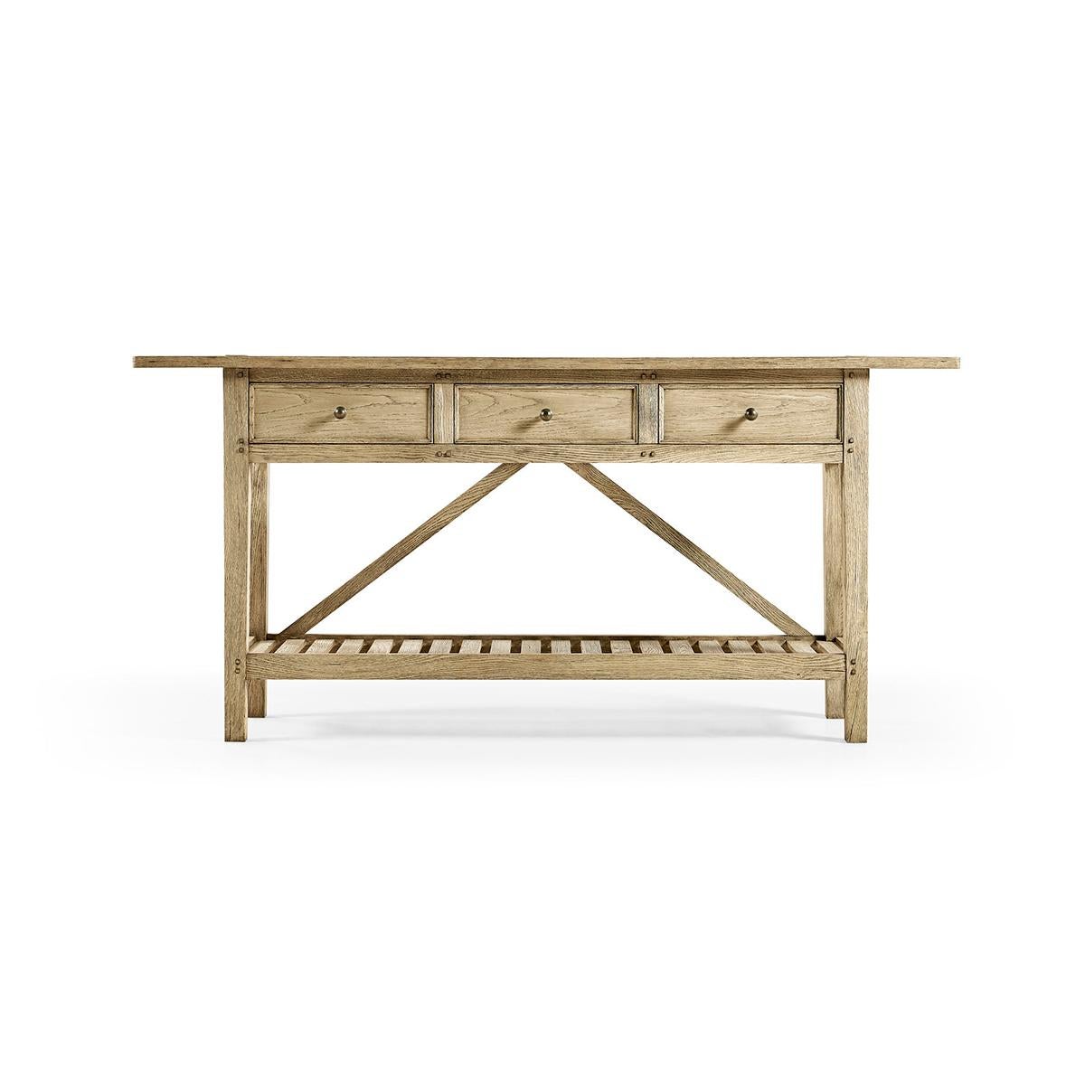 Hand-built from Solid Oak with Chestnut Veneers bleached and lightly wire-brushed to accentuate exquisite wood grain patterns. The console evokes the ethereal old-world charm of the French countryside and rustic living.

The plank top above three