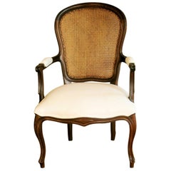 French Louis XVI Style Armchair Carved Walnut with Caned Backrest