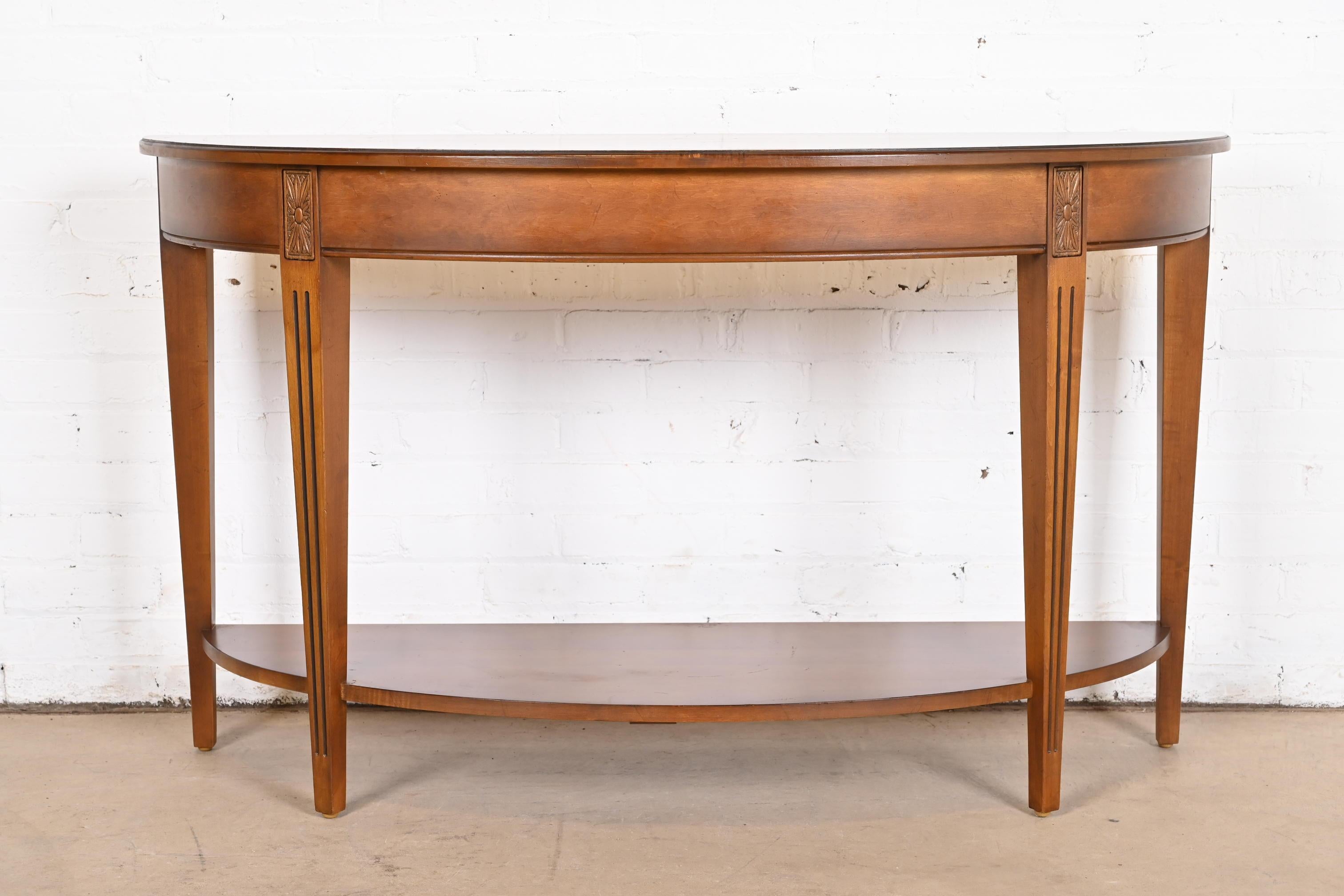 A gorgeous French Country style maple demilune console table or sofa table

USA, Late 20th Century

Measures: 52