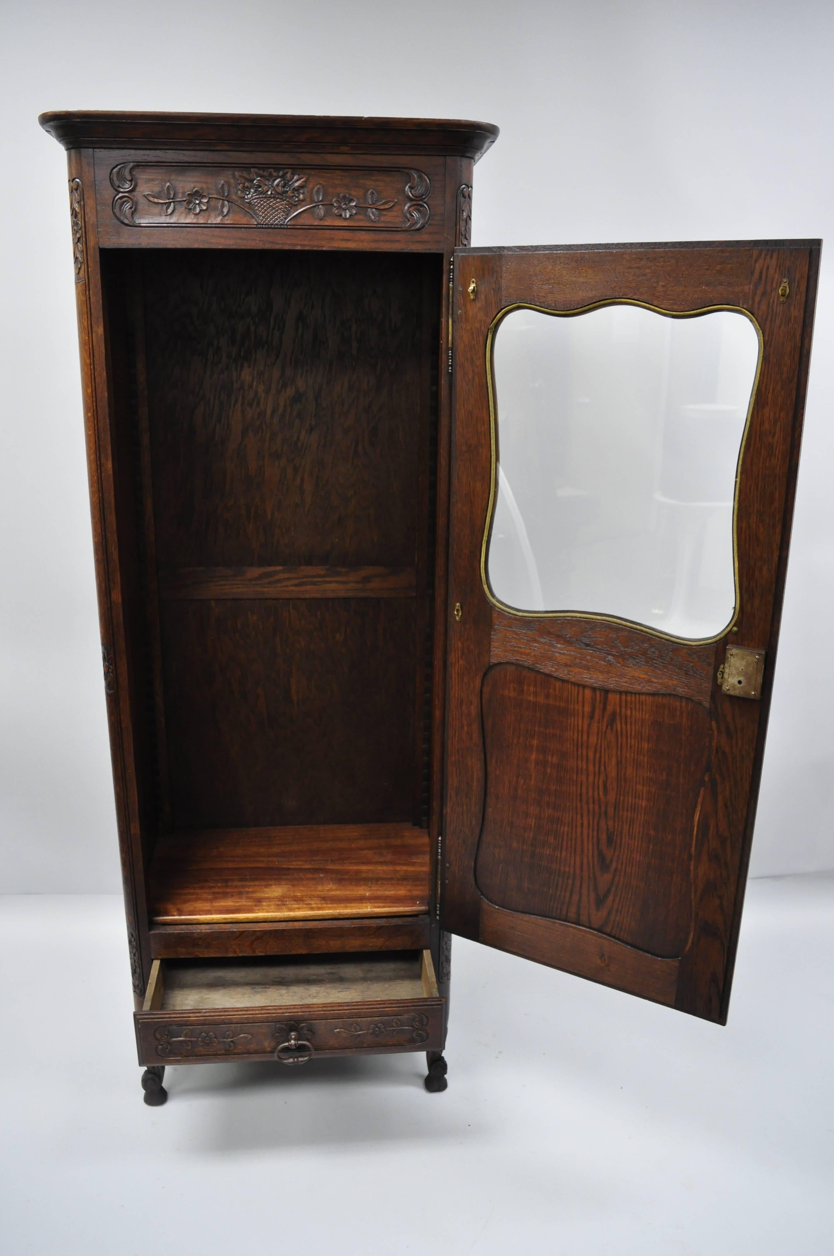 French Provincial Oak Wood Narrow Floral Carved Curio Cabinet Vitrine Cupboard In Good Condition In Philadelphia, PA