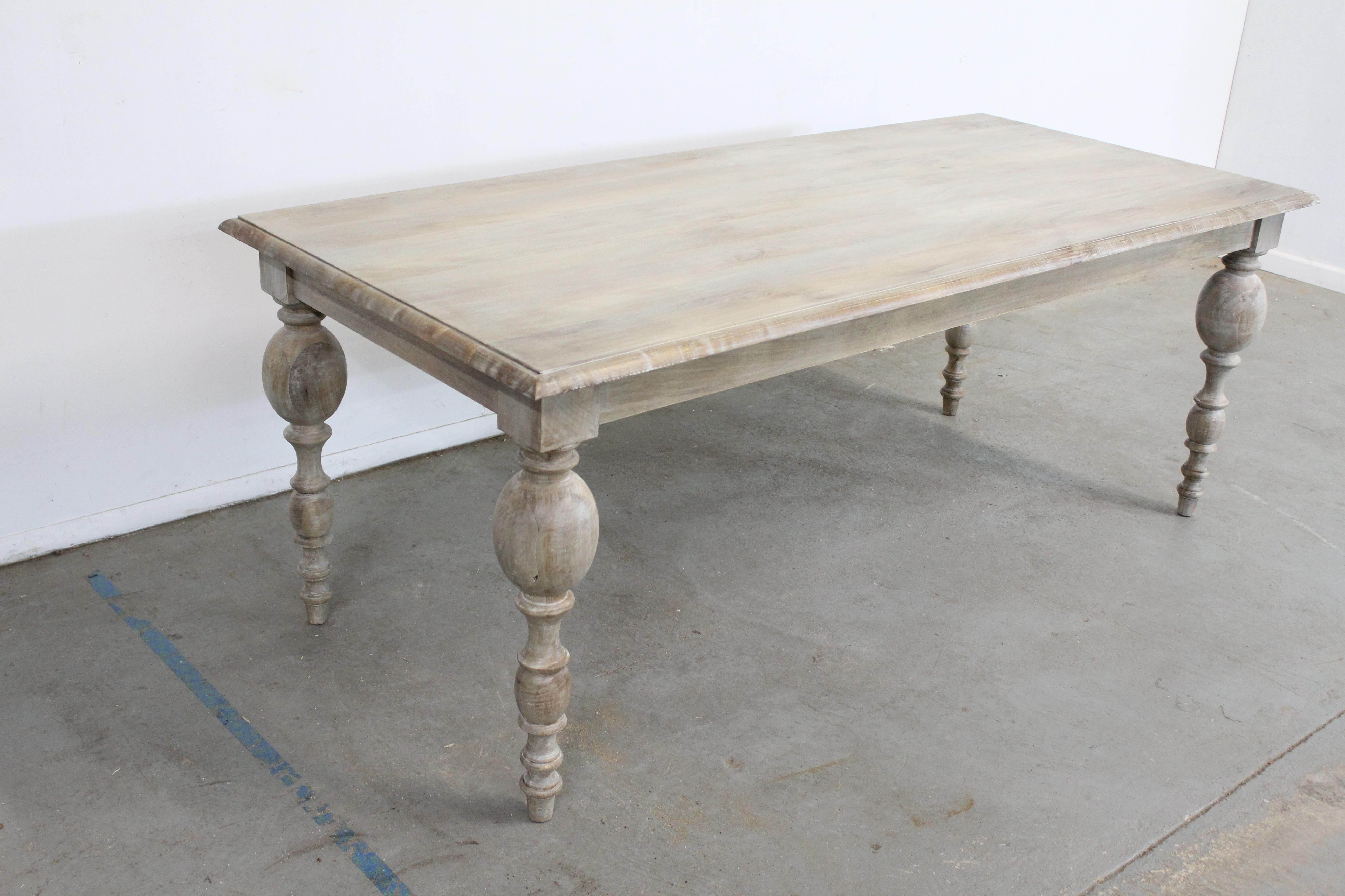 What a find. Offered is a solid wood French country dining table. It has a great look to it with carved legs and a rustic finish. This piece has never been in a home and is a floor model. Each table has a rustic finish and will have slightly