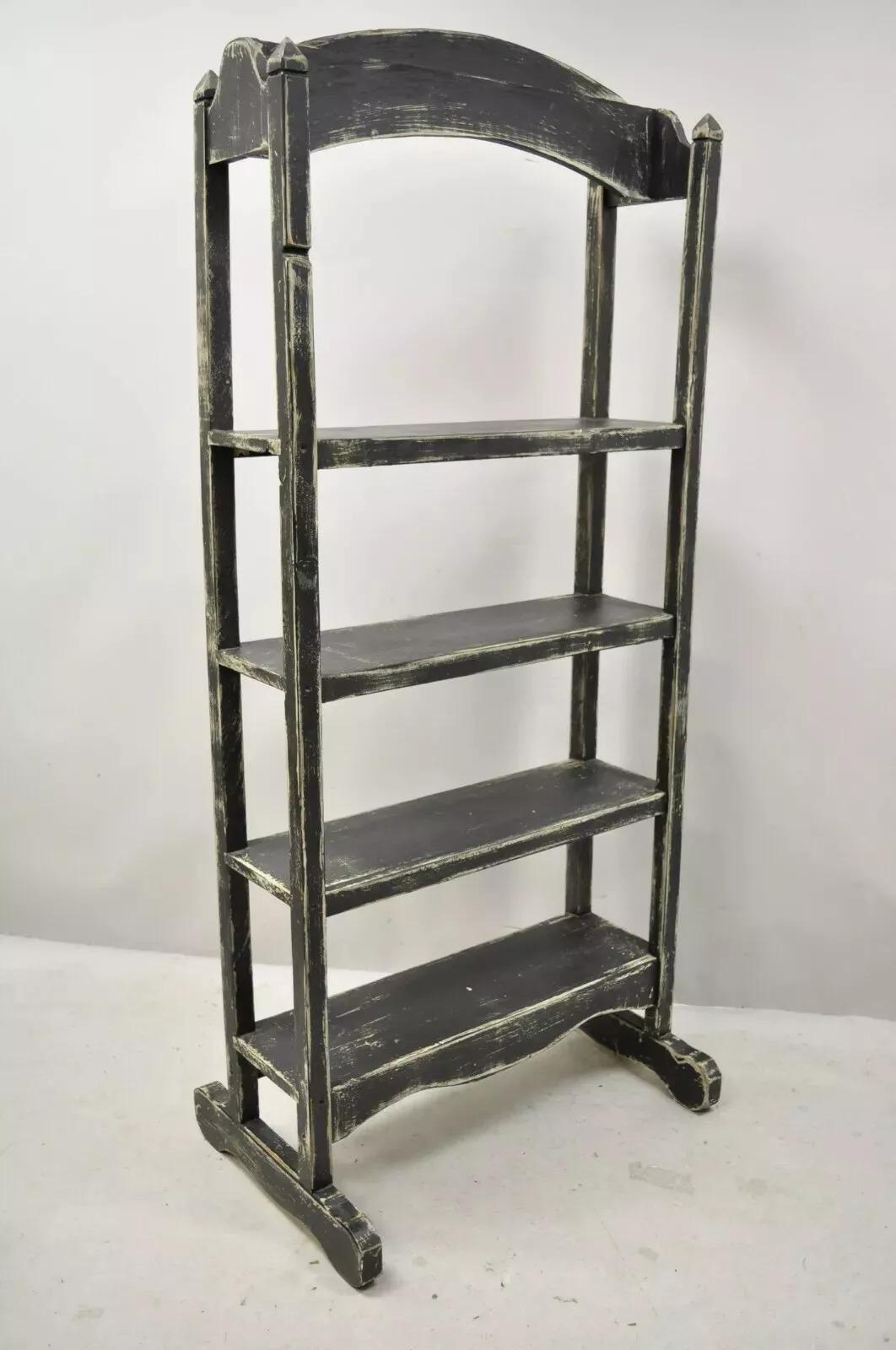 French Country Provincial Style Black & White Distress Painted Bookcase Display Stand. Item features a wood construction, black and white distressed finish, 4 wooden shelves, great style and form. Circa Late 20th Century. Measurements: 68