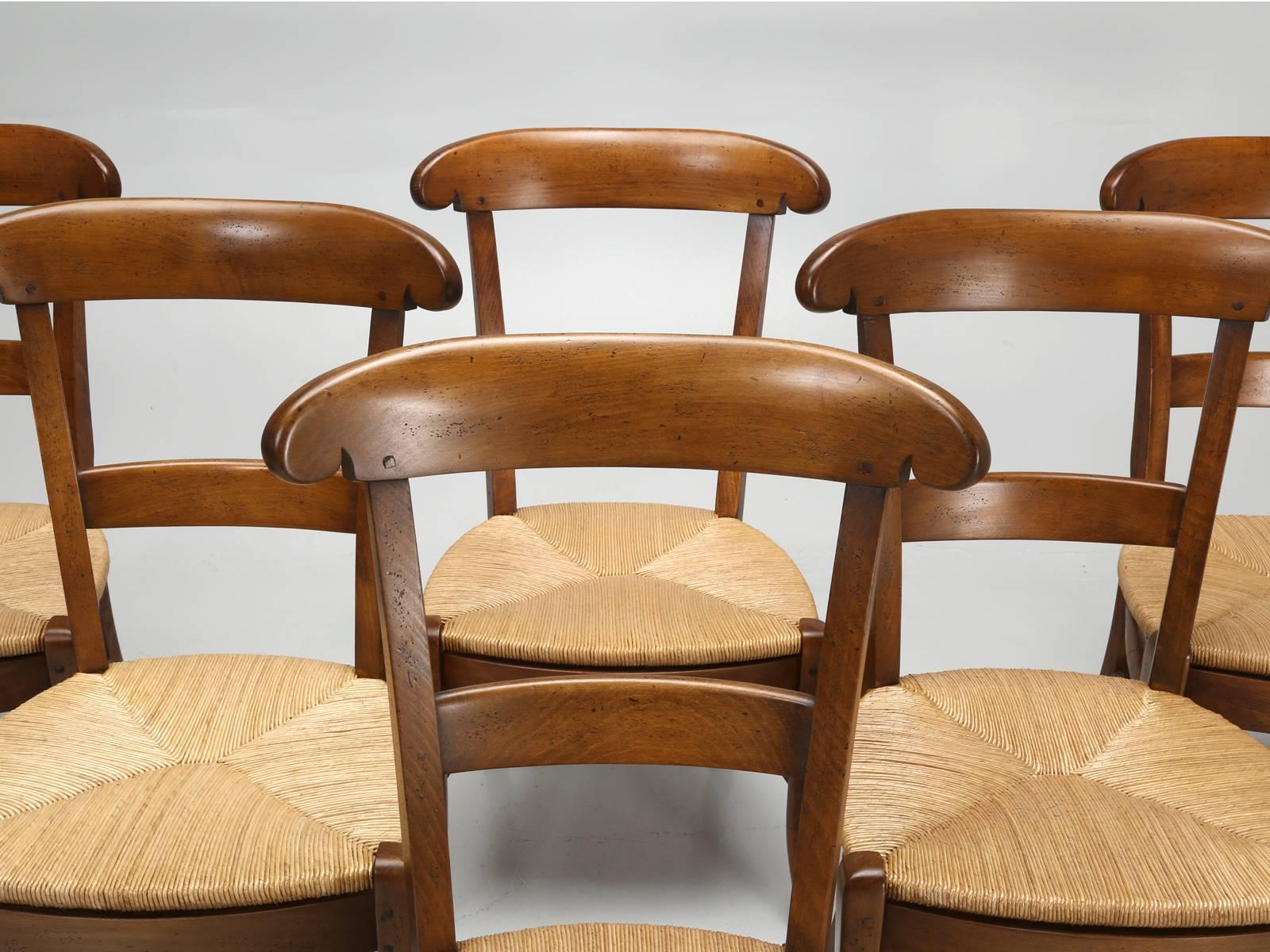French set of (eight) handmade dining chairs, that are extremely comfortable. We special order these French Country dining chairs, from a supplier who has been making French dining chairs for over 160 years, in the same building. The chairs are,