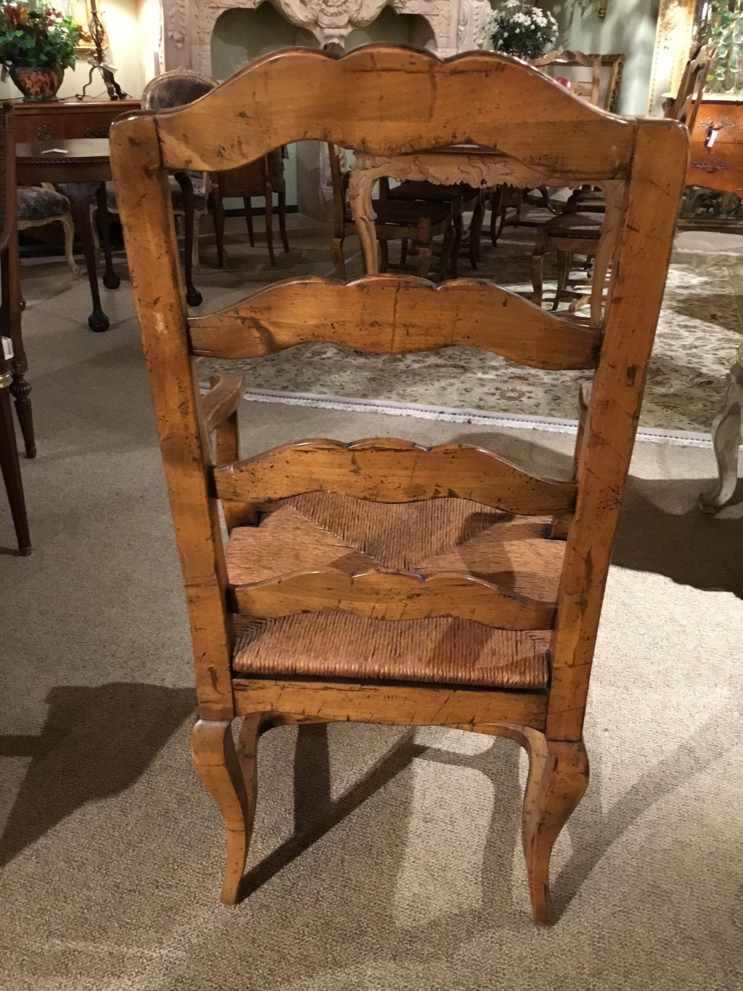 Lovely set of 8 French country style chairs in a beautiful honey colored finish
That has a distressed application. All are structurally sound and all are without
Any problems. The tall ladder back is very elegant. A floral motif is carved at
The