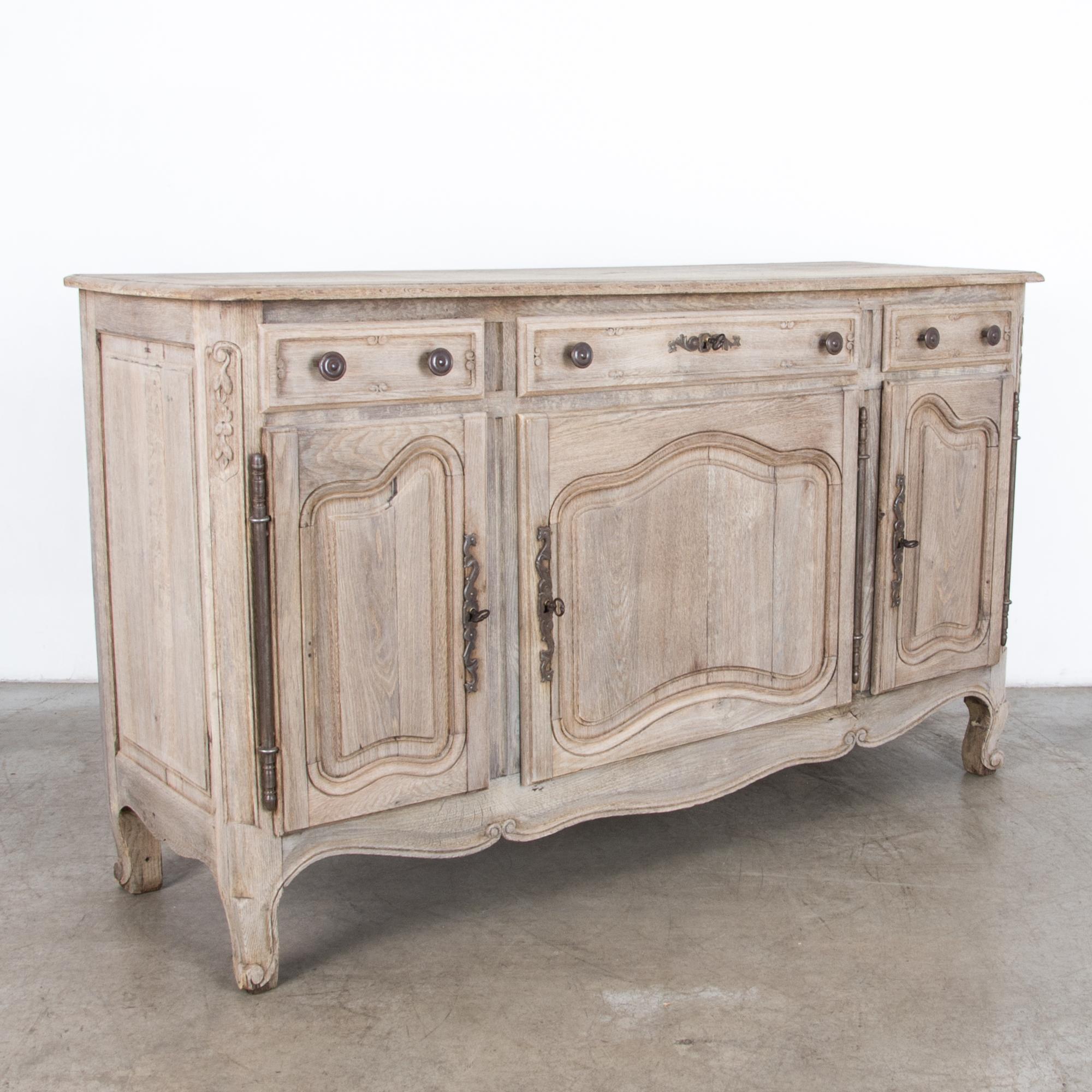 Early 20th Century French Country Three-Door Oak Buffet