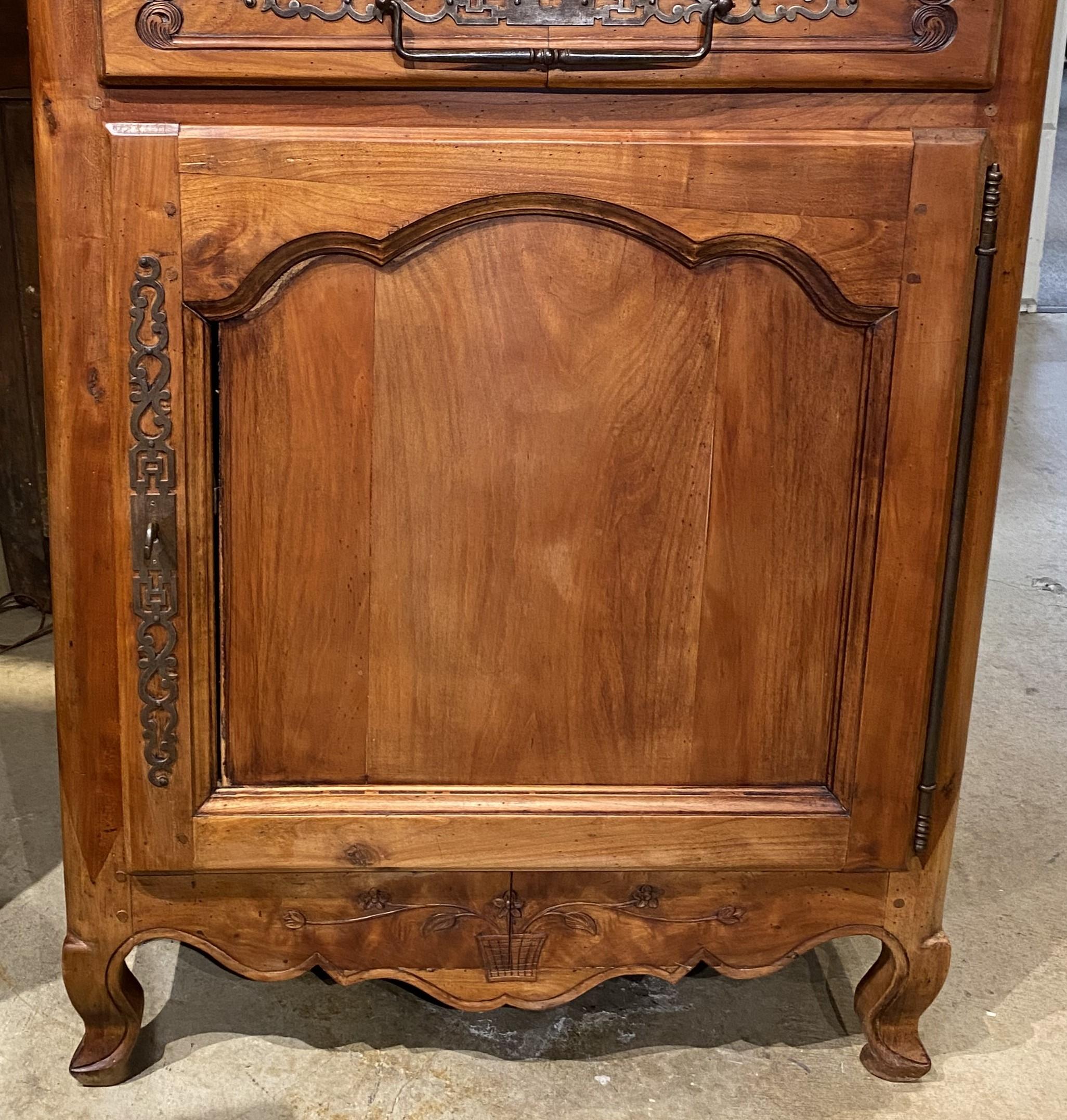 French Provincial French Country Two Door Fruitwood Cupboard with Carved Floral Detail For Sale