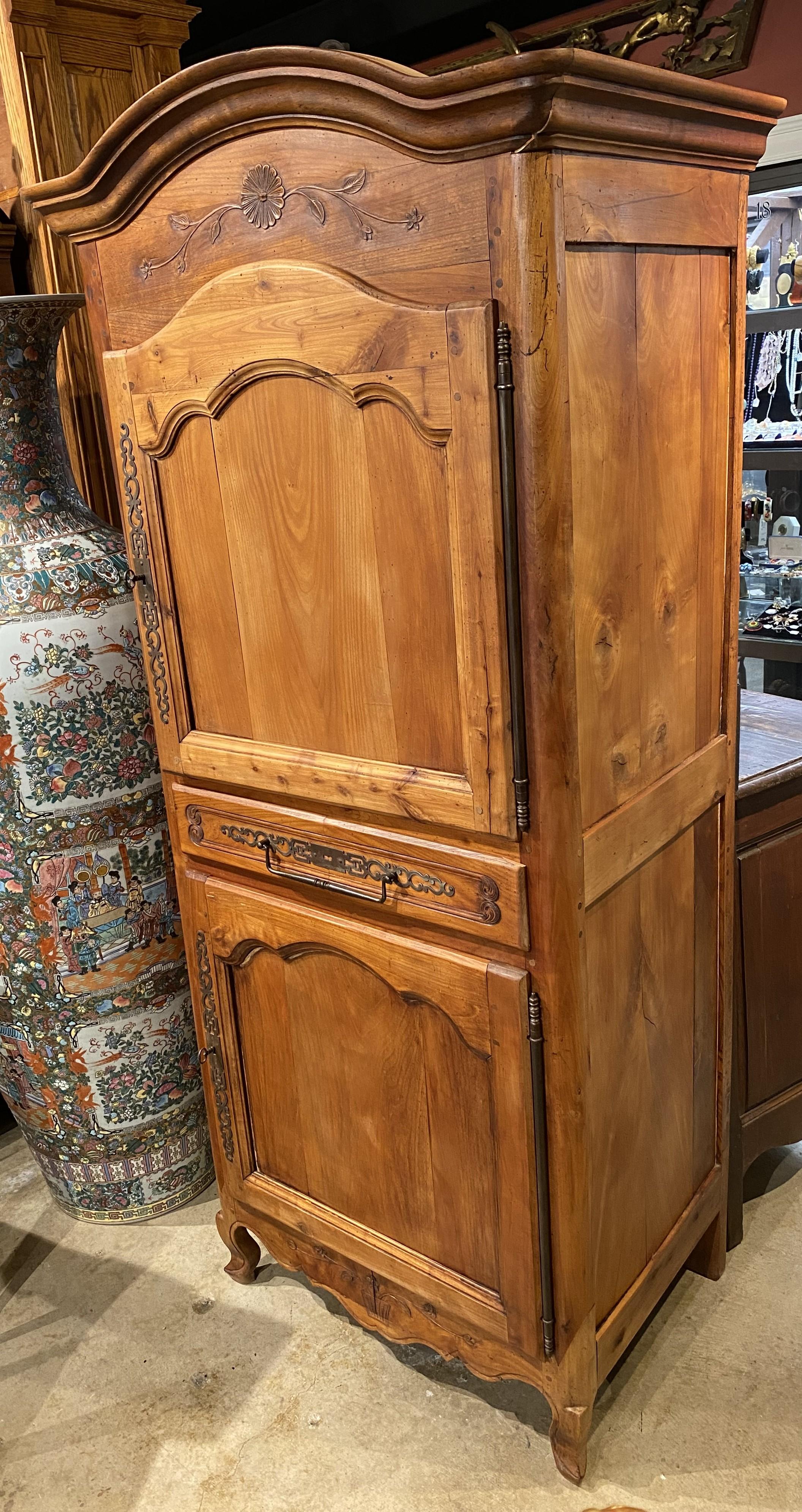 19th Century French Country Two Door Fruitwood Cupboard with Carved Floral Detail For Sale