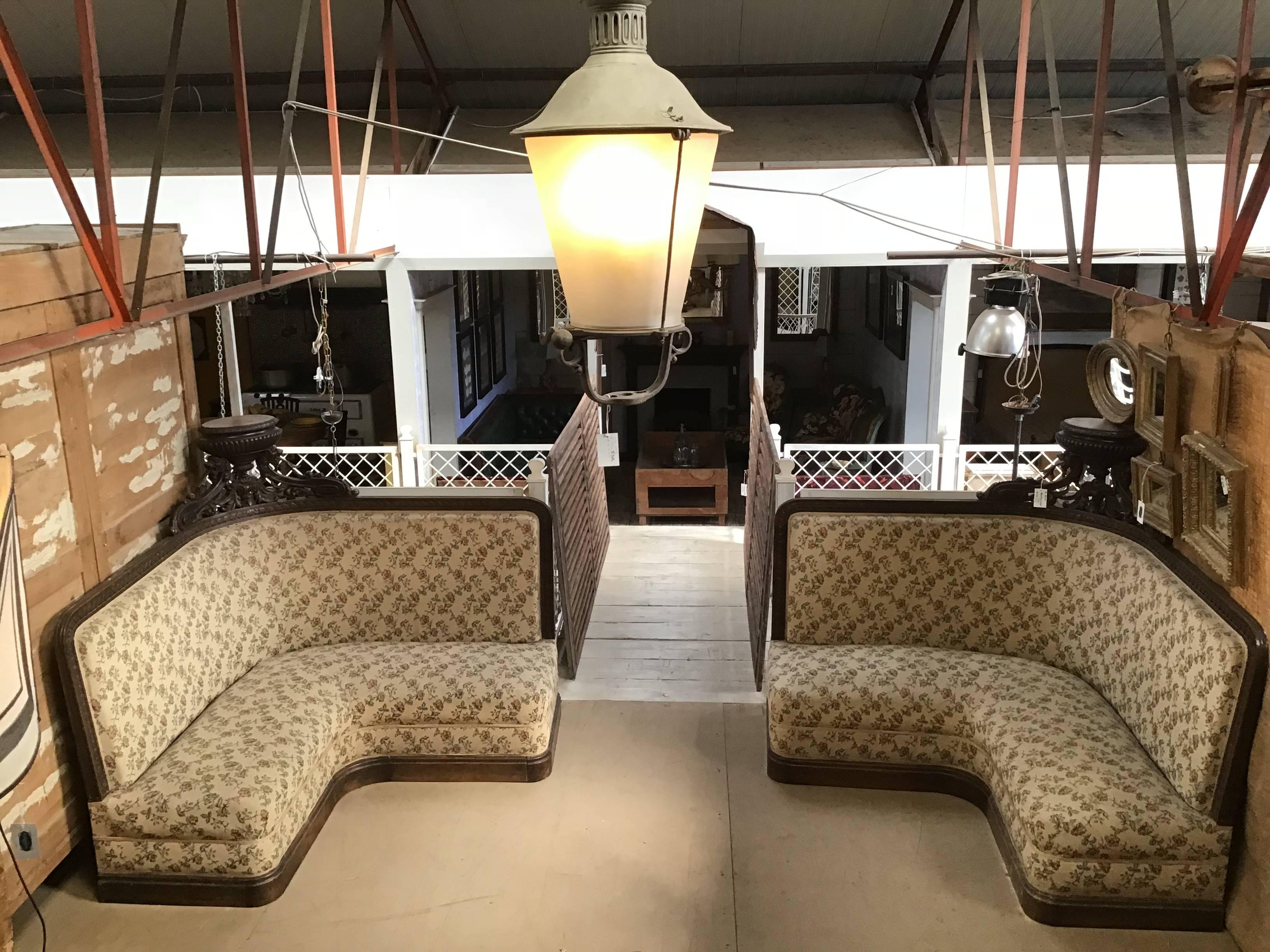 French couple of corner upholstered sofas with walnut wood frame and medal from 1890s.