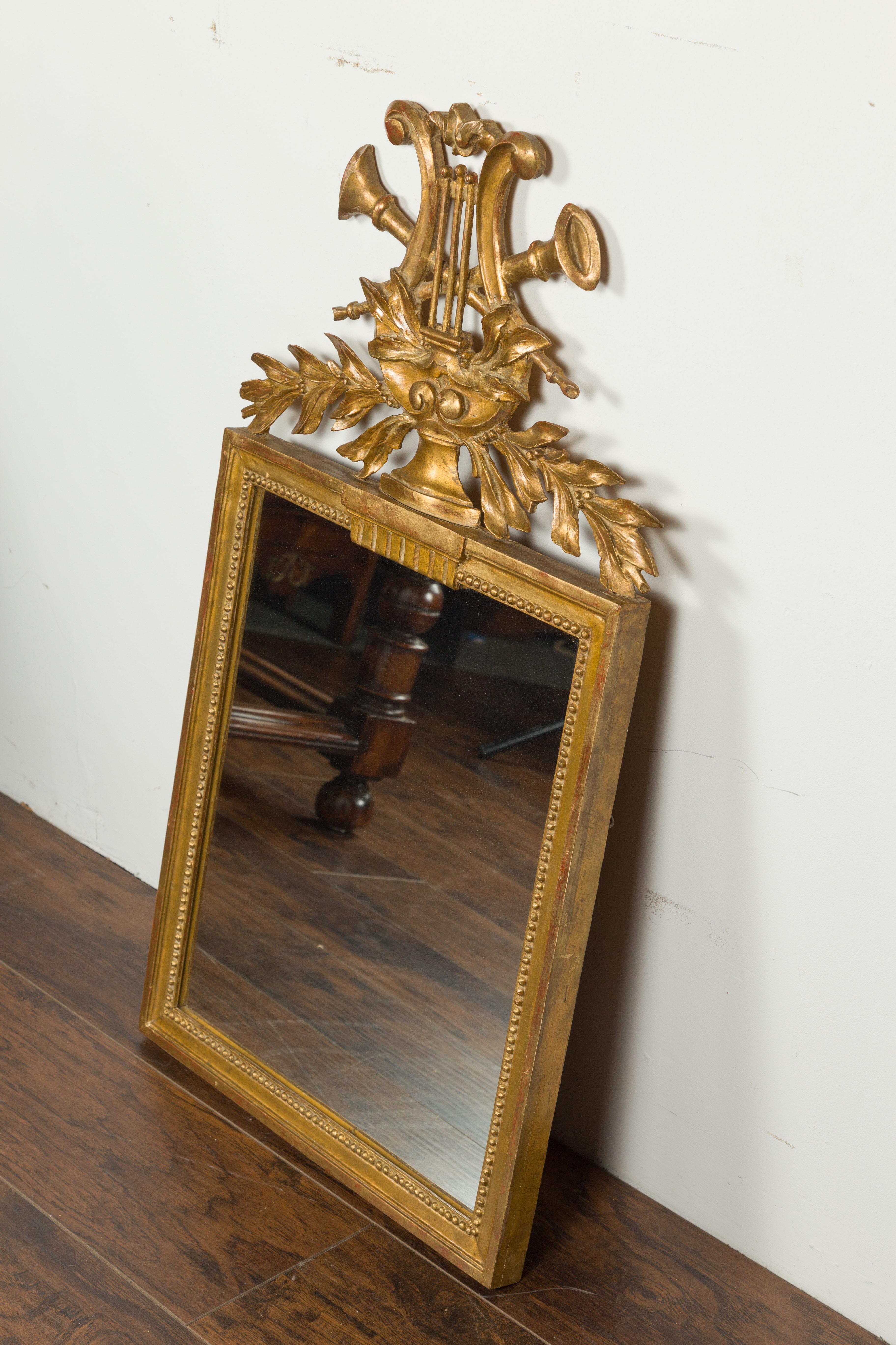 French Crested Giltwood Mirror with Carved Music Allegory, circa 1900 For Sale 1