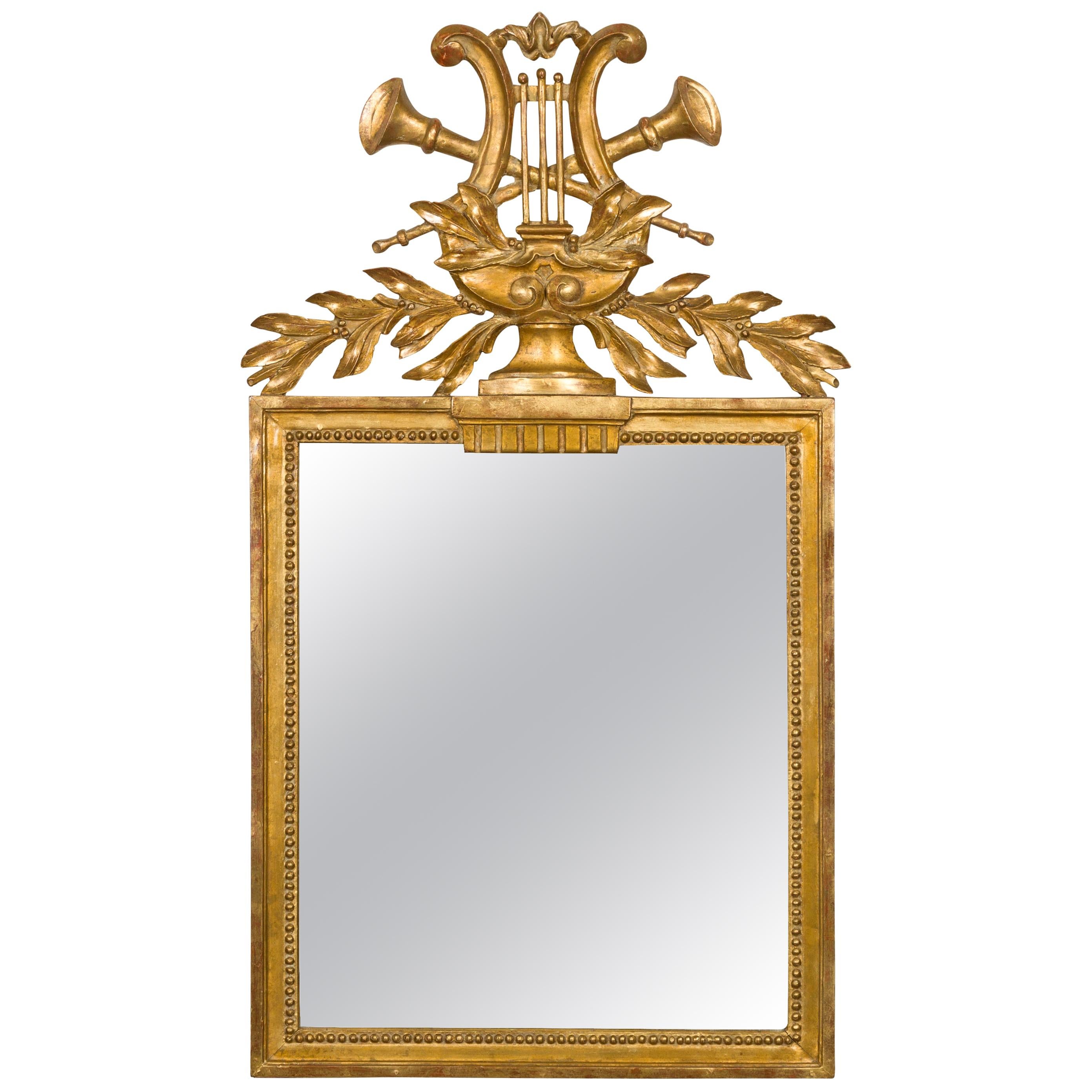 French Crested Giltwood Mirror with Carved Music Allegory, circa 1900 For Sale