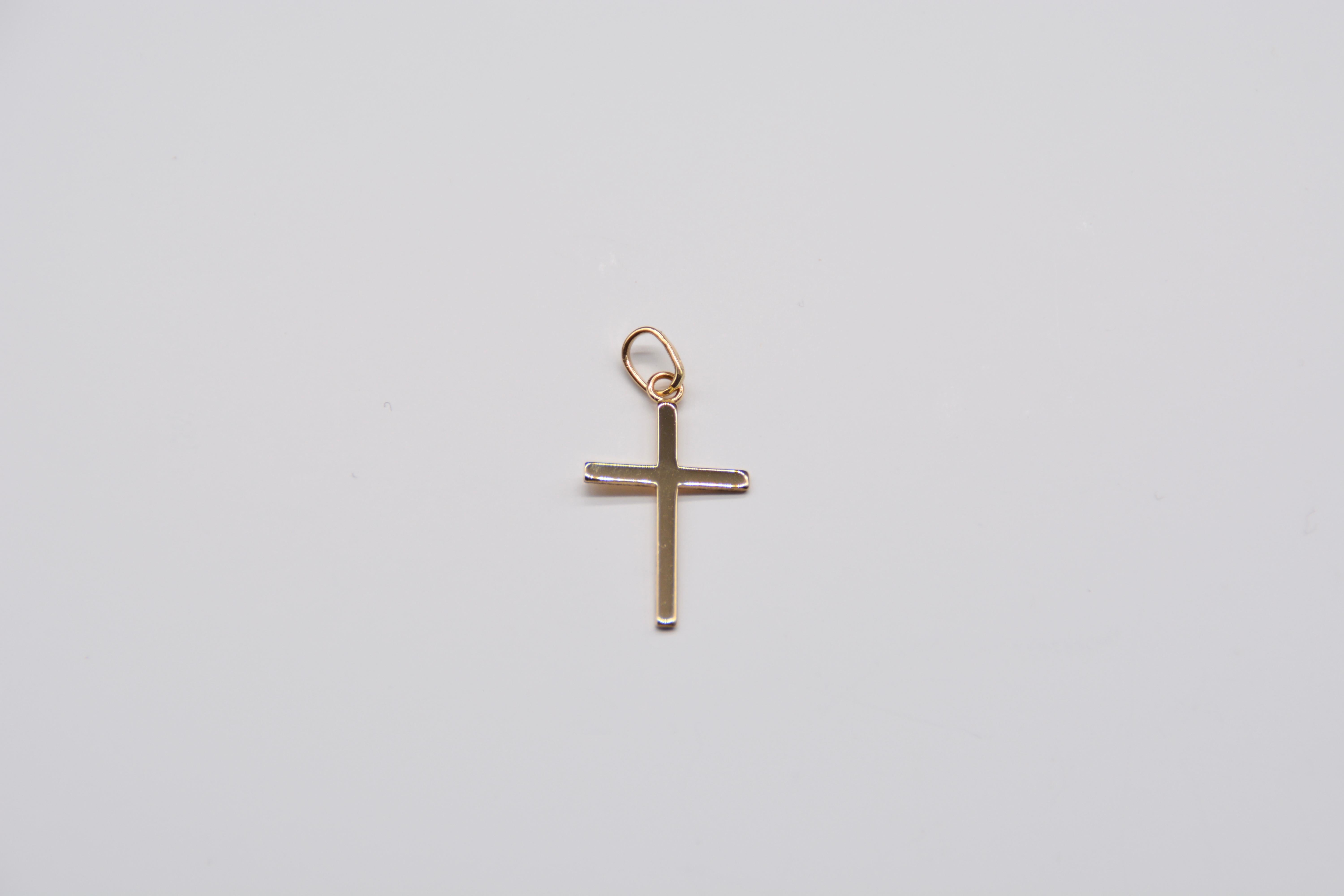 French Cross Pendant Gold Yellow Thin

This elegant French cross in 18 carat yellow gold is a perfect choice for religious events for the whole family. With its slim and delicate design, this cross can be worn by young and old, adding a touch of