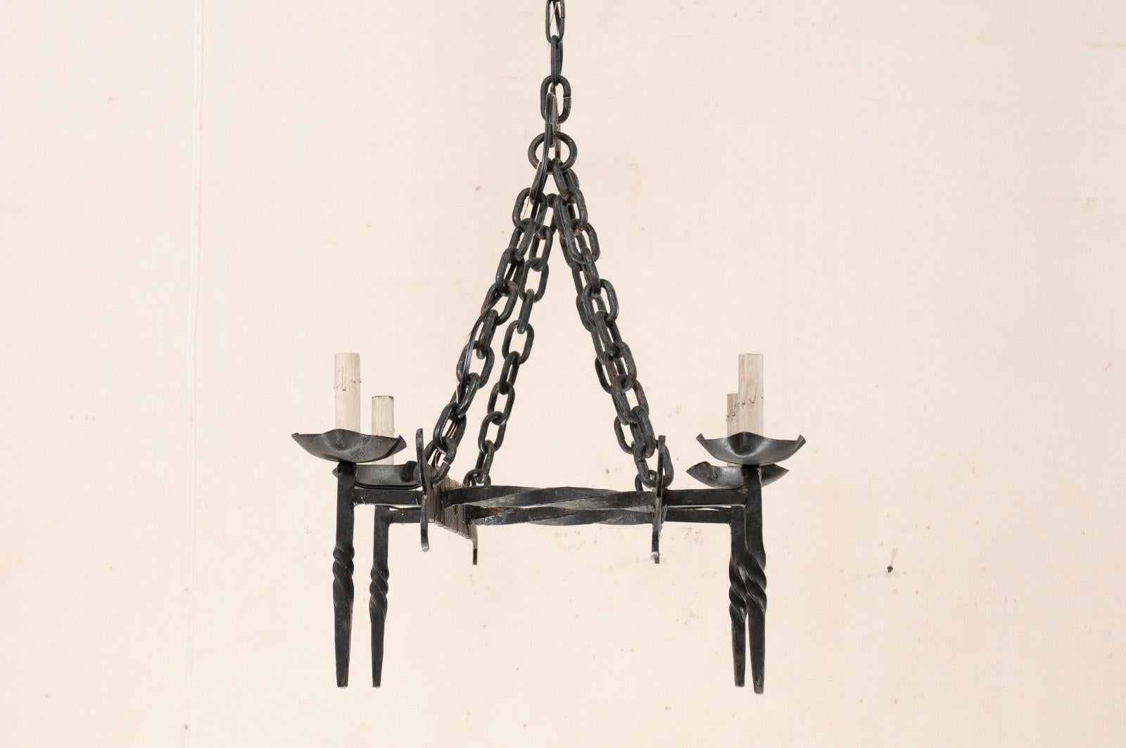 Forged French Crossed-Bar Four-Light Iron Chandelier from the Mid-20th Century For Sale