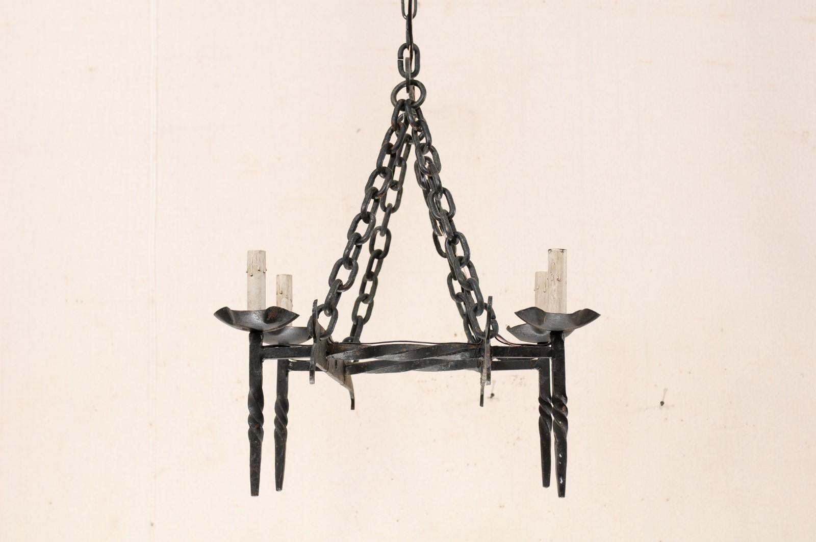French Crossed-Bar Four-Light Iron Chandelier from the Mid-20th Century In Good Condition For Sale In Atlanta, GA