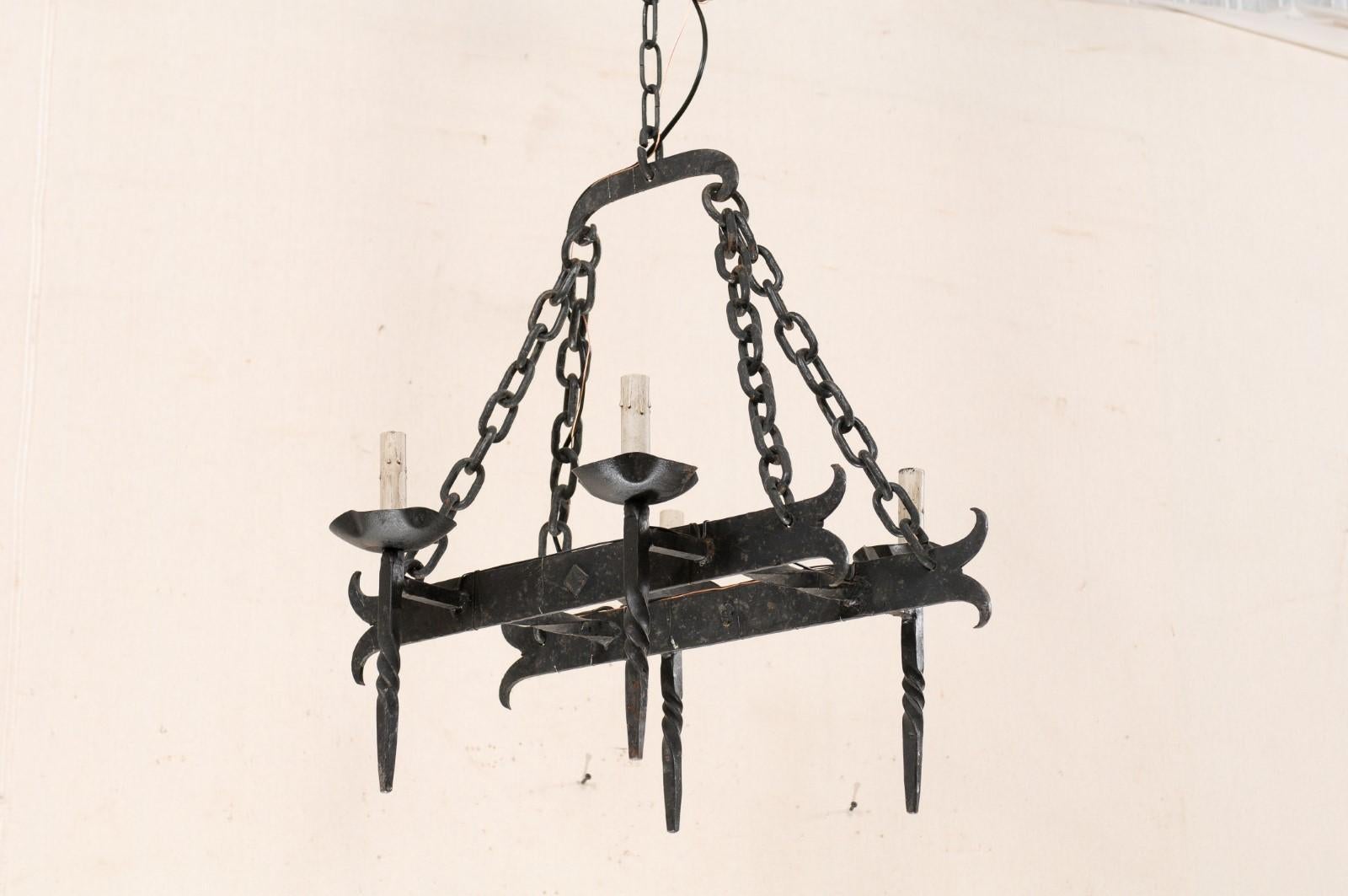 French Crossed-Bar Four-Light Iron Chandelier from the Mid-20th Century For Sale 1