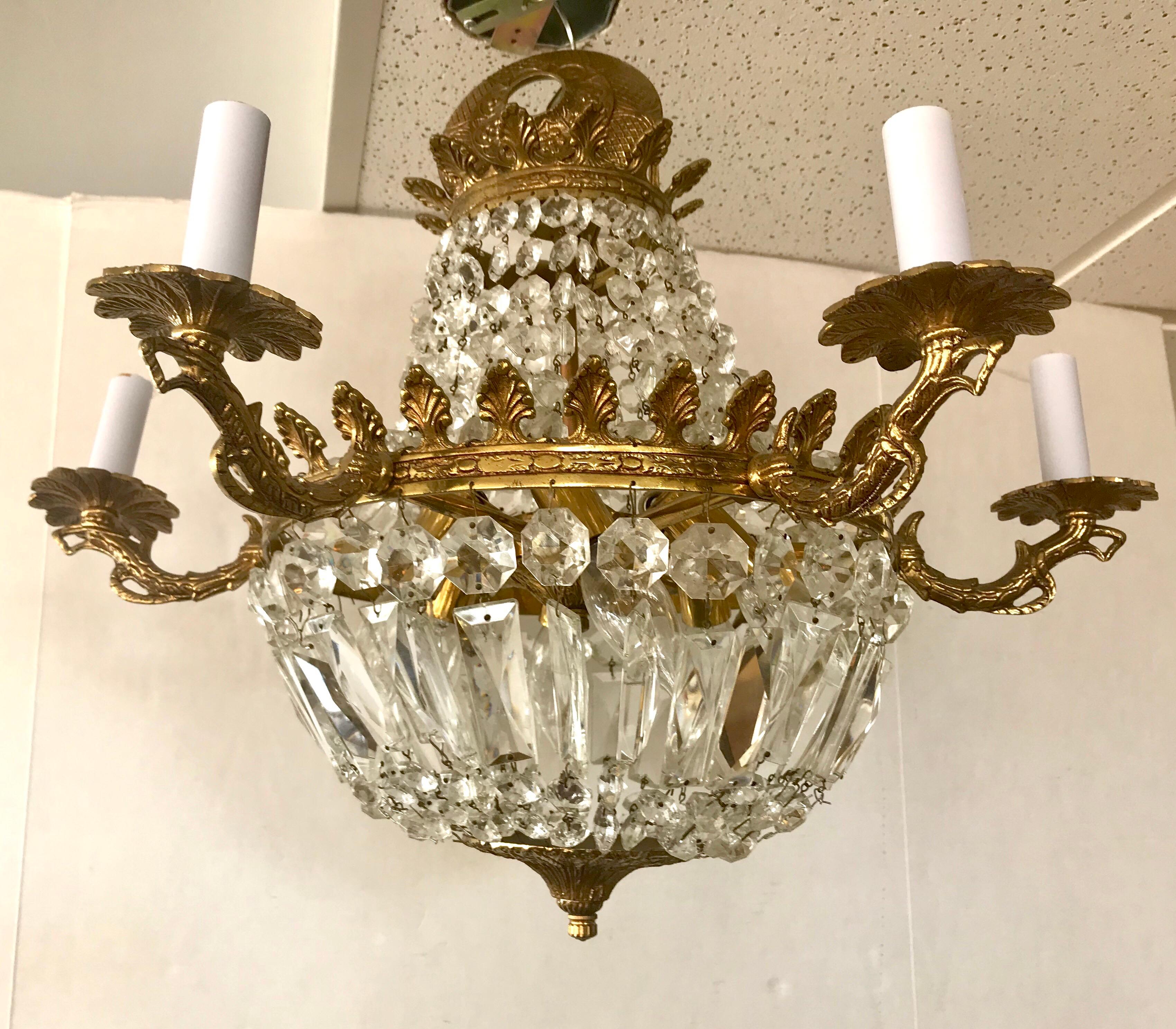 Stunning twelve-light bronze and crystal basket chandelier, circa 1950s. Wired for USA and in great condition.