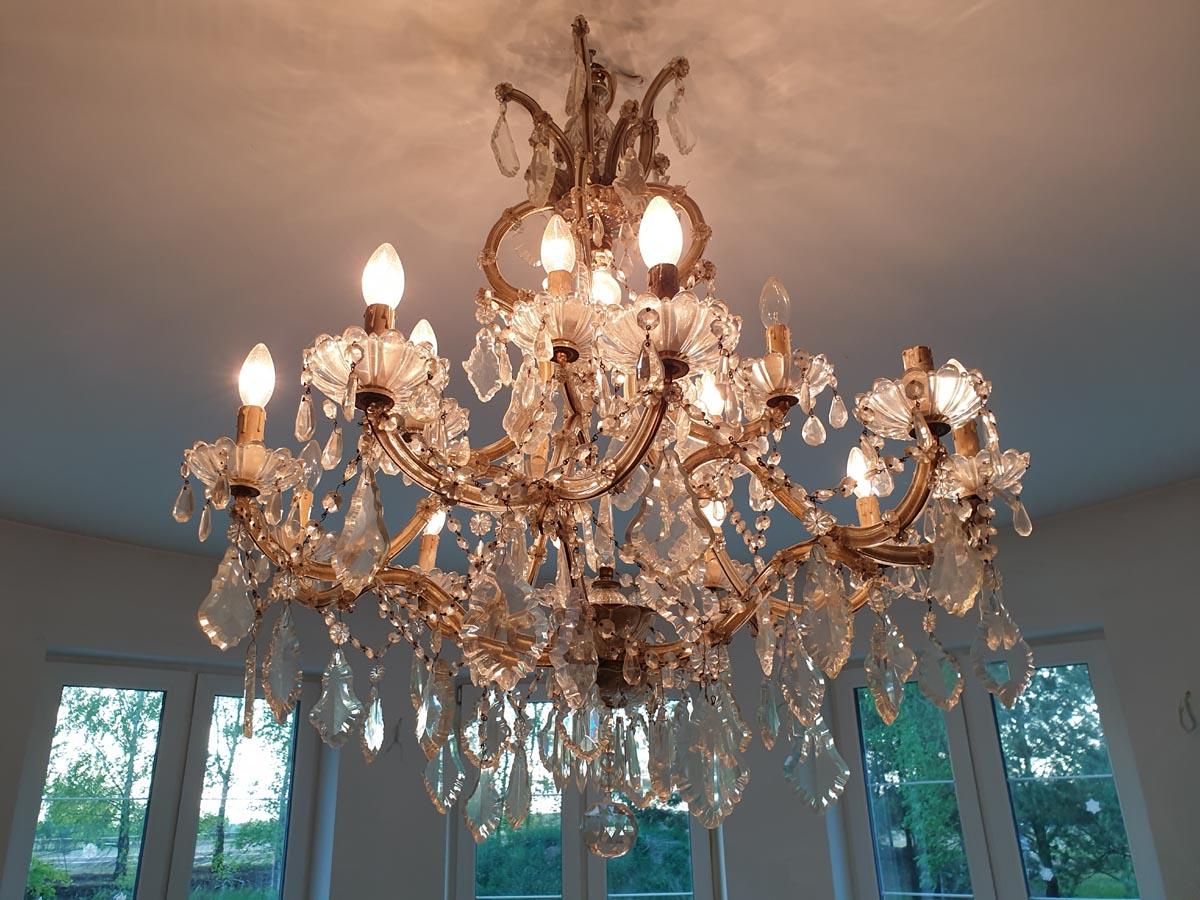 Beautiful, original, palace crystal chandelier Marie Therese with an exceptionally rich, Rococo pattern.

Despite the large dimensions - very shapely.

2 levels, 15 candles.

Extremely effective, prestigious and presentable.

Recommendable