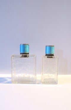 Bottiglie da vanità francesi in cristallo e smalto guilloché in argento, coppia/set