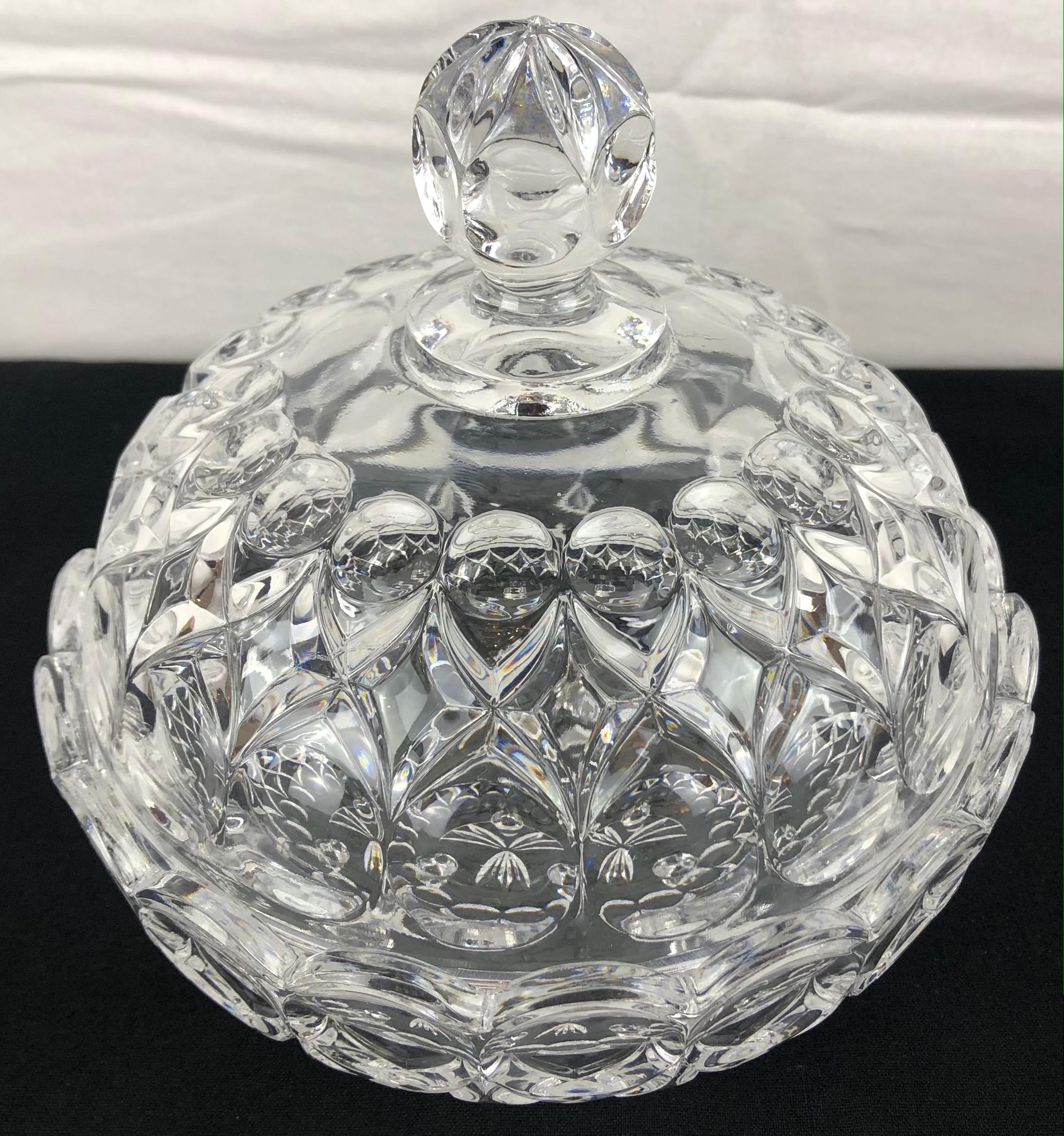 Beautiful and decorative candy dish, trinket, or jewelry box. 

Very good quality crystal, makes a lovely gift to oneself or others.

Measures: 6 1/2