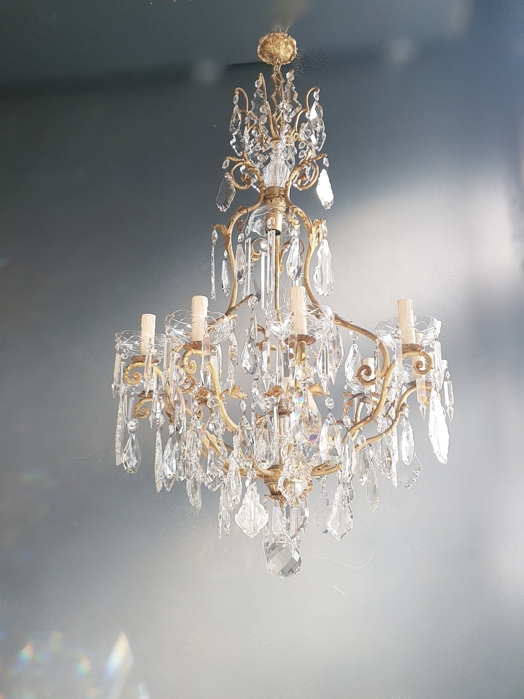 French crystal chandelier antique ceiling lamp lustre Art Nouveau lamp rarity

Measures: Total height 125 cm, height without chain 110 cm, diameter 73 cm. Weight (approximately): 15kg.

Number of lights: Nine-light bulb sockets: E14 and One E27