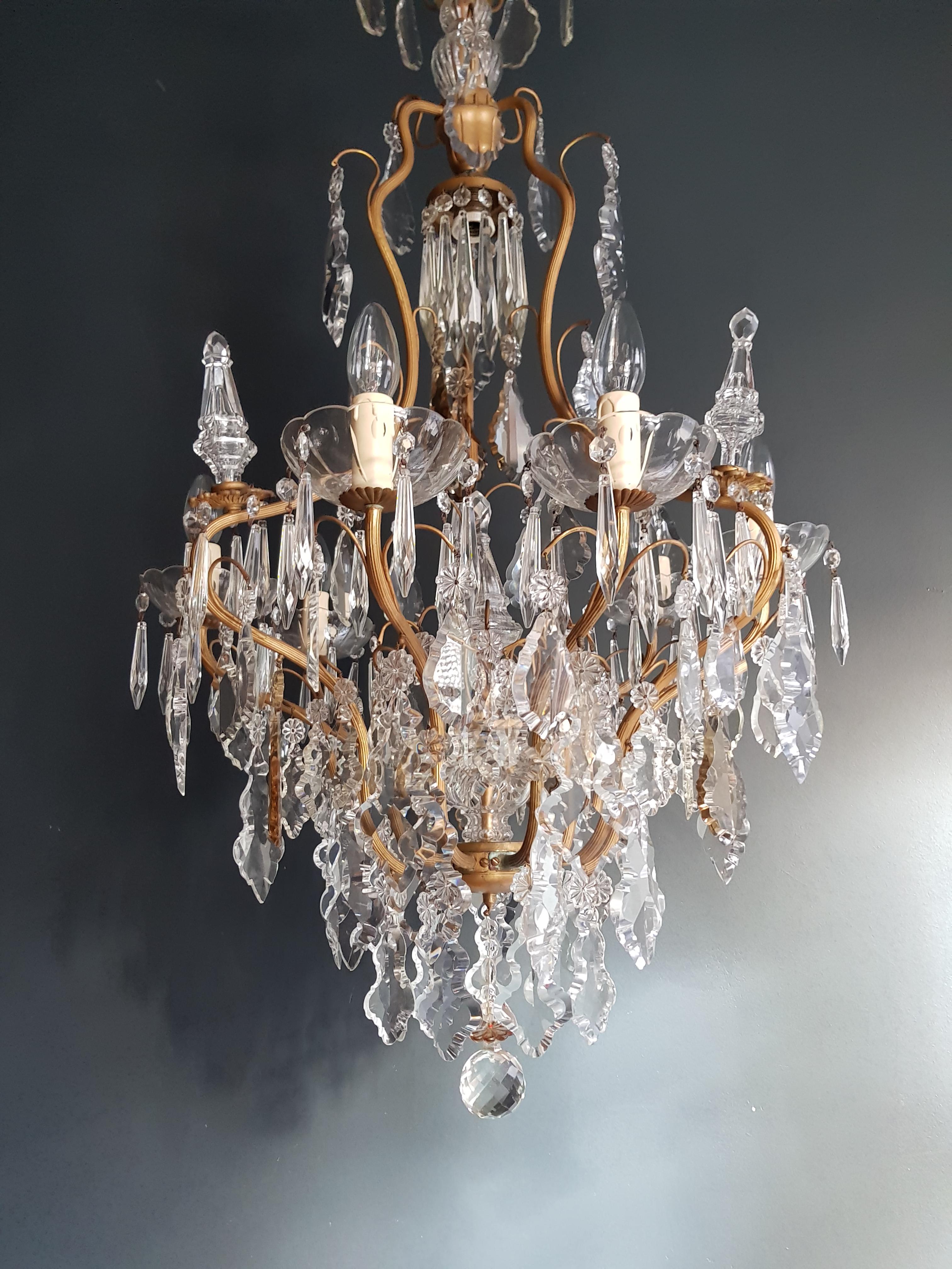 French Crystal Chandelier - Antique Ceiling Lamp Radiating Art Nouveau Elegance

Presenting a remarkable French crystal chandelier, an embodiment of opulence from the Art Nouveau era, meticulously restored with care and devotion in Berlin.

Expertly