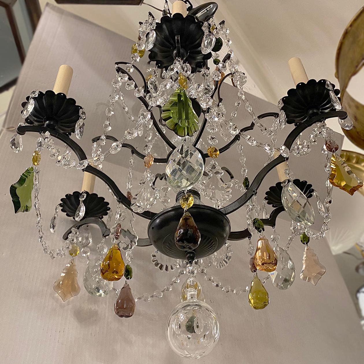 A circa 1940's French patinated bronze chandelier with crystal pendants and glass fruit.

Measurements:
Height: 32.5