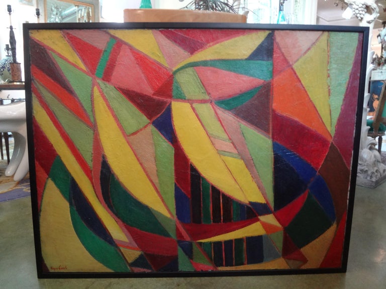 Large French midcentury cubist oil on canvas signed Roger Carle. This striking colorful cubist painting has a bold color palette and dates to the 1960s.
Perfect size for over a console table, credenza, commode, buffet or sofa.