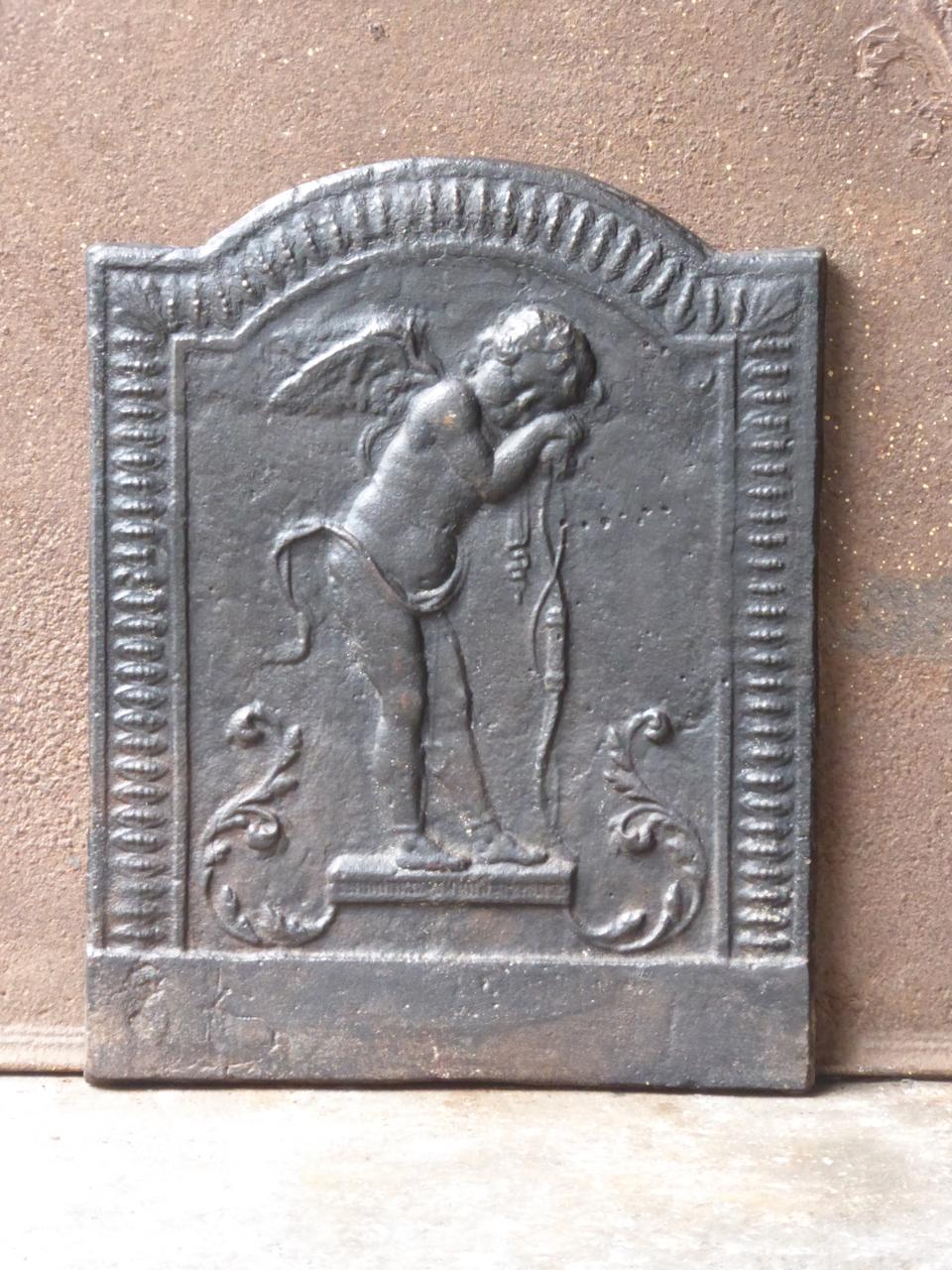 French Empire style fireback with a cupid.







 