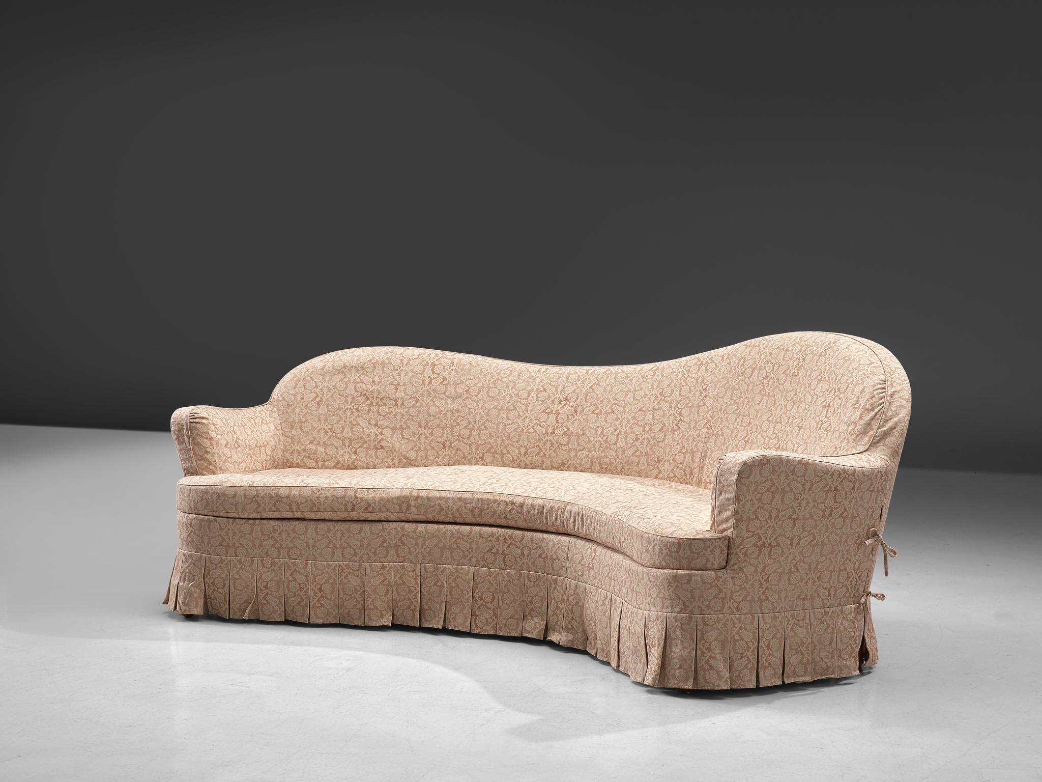 Curved sofa with stained beech frame and fabric, France, 1930s.

Extra-ordinary sofa of which we cannot identify its origin after long research. We expect it to be French or Swedish, based on the aesthetic features and materialization. The sofa