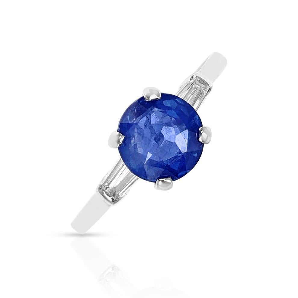 A French Cut Sapphire, weighing appx 4 carats, mounted in a ring with diamonds. The ring is crafted in Platinum. The ring size is US 10.50. The total weight of the ring is 5.60 grams.
