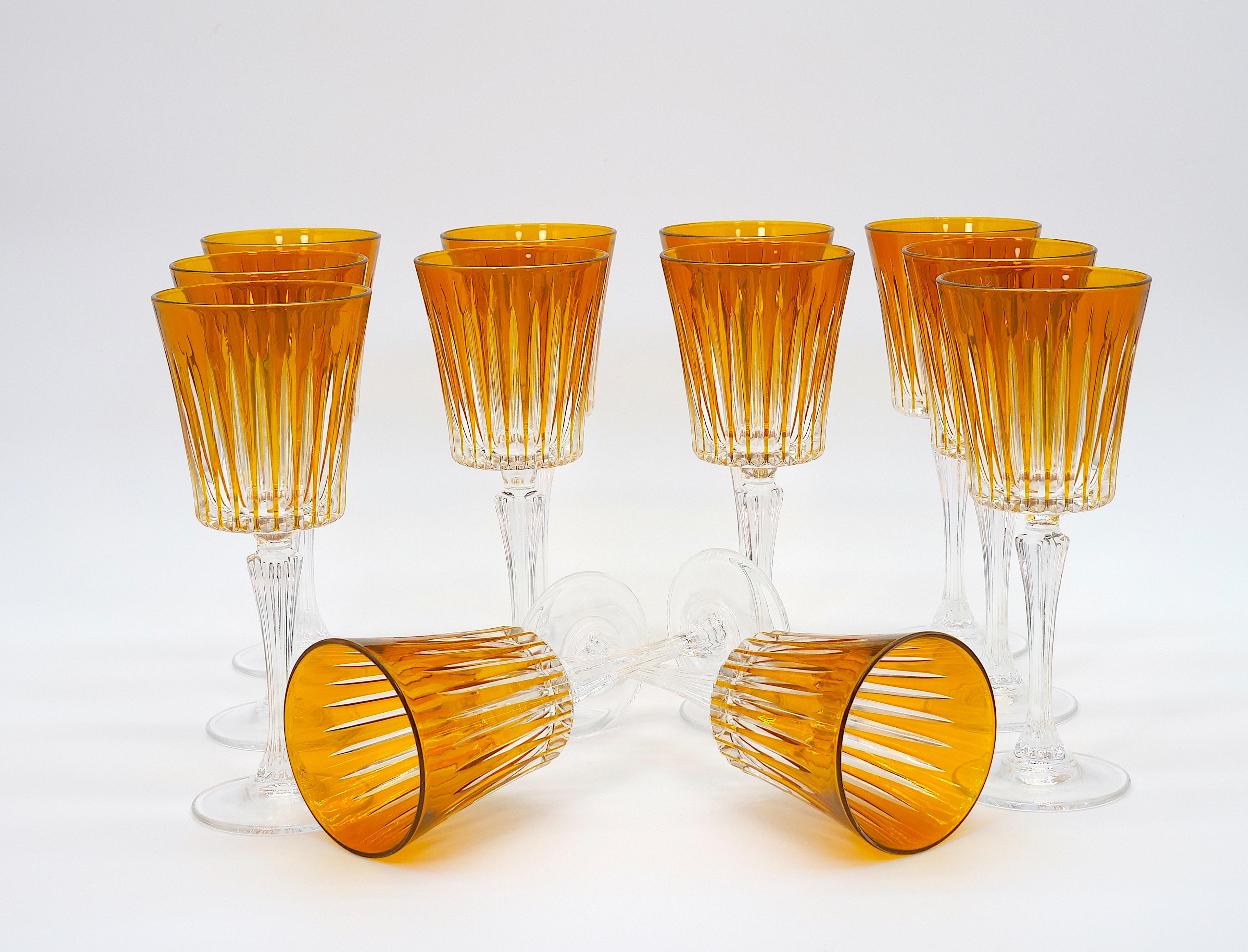 Beautiful orange color French cut crystal paneled design tableware or barware wine and water glassware service for 12 people. Each glass is in great condition. Maker's mark undersigned. Each glass is in excellent condition. Minor wear consistent