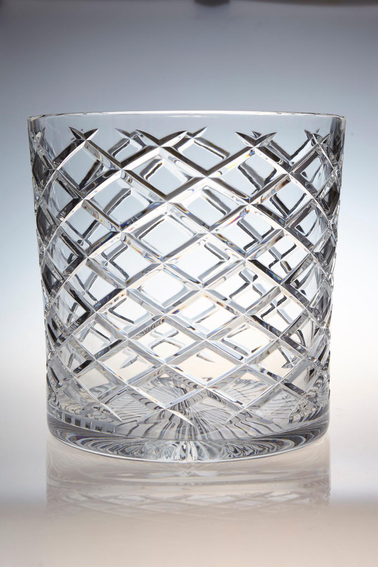 Extremely heavy and impressive French crystal wine cooler or champagne ice bucket for two bottles, with a diamond cut design. The diameter is 9.75 inches. The ice bucket is in excellent condition. France, circa 1960s.

 