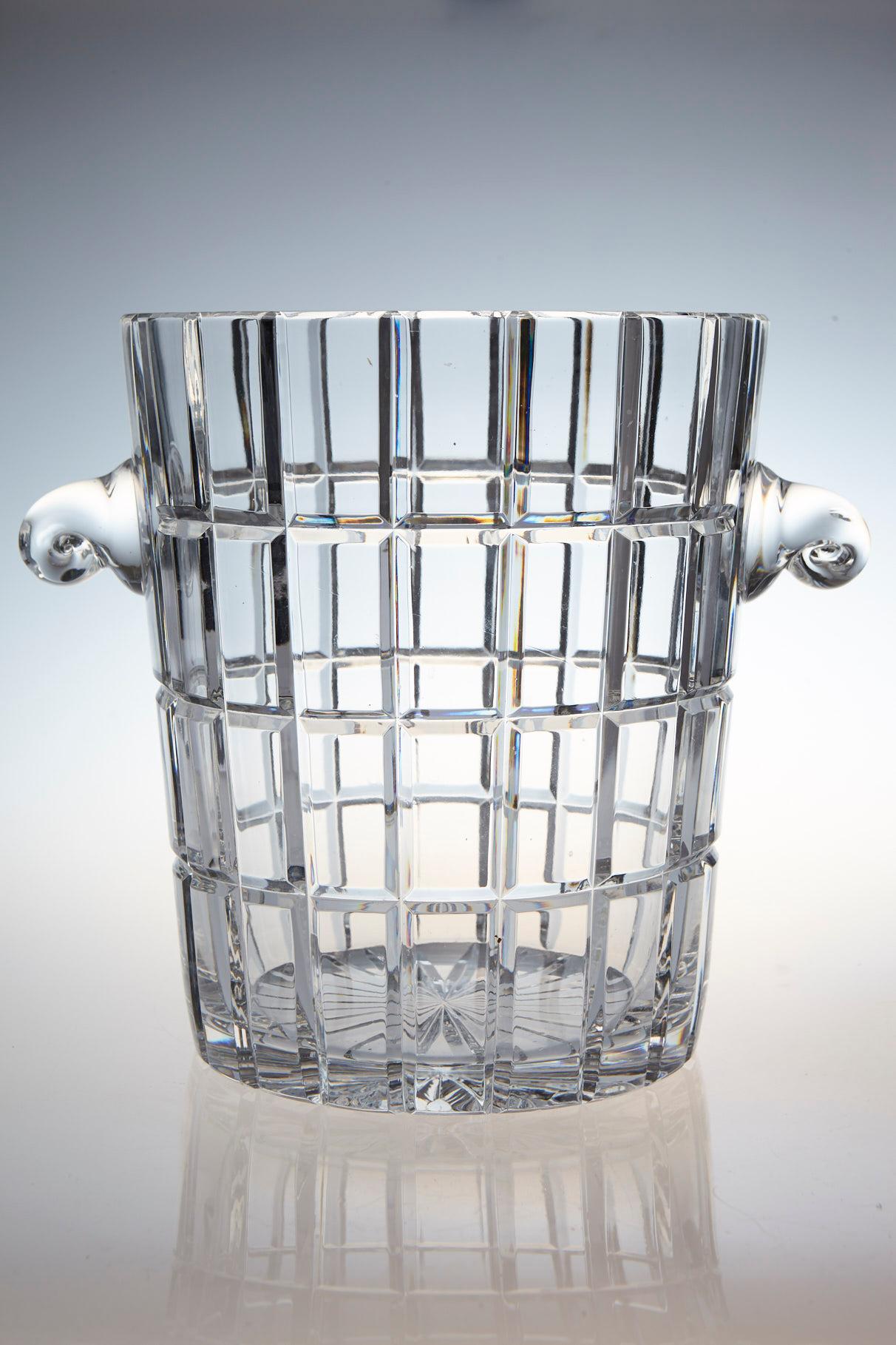 Extremely heavy and impressive French crystal wine cooler or champagne ice bucket with a graphic cut design and sculpted handles. The diameter without the handles is 7.75 inches. The ice bucket is in excellent condition. France, circa 1960s.

 