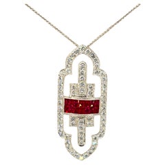 Pendentif en or blanc 18 carats avec diamants et rubis de taille française