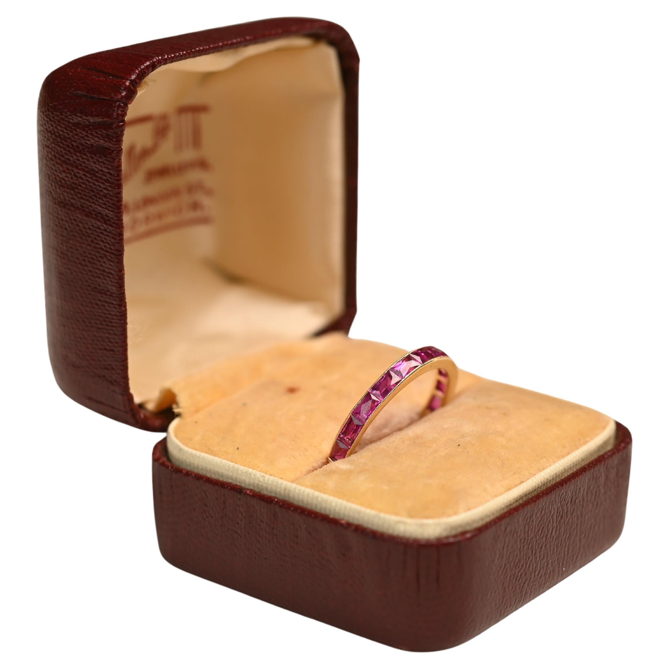 French Cut Ruby (Approx. 1.3-Carats) Channel-Set Eternity Band, 18k Yellow Gold For Sale