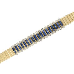 Armband aus 18 Karat Gelbgold mit Saphiren im französischen Schliff und Diamanten