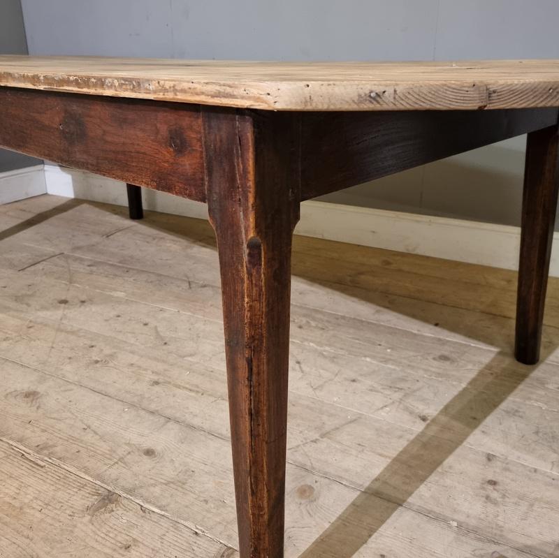 Wonderful French D-ended farm table with an elm base and lovely scrubbed pine top. 1840.

25.5