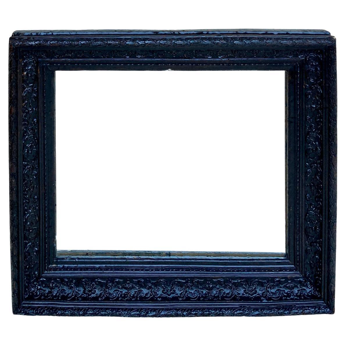 Mirror from the 1920s, made up of a large black walnut wood frame that elegantly supports the mirror. Original mirror.
Frameless mirror measurements:
height: 53.5cm
width: 65cm