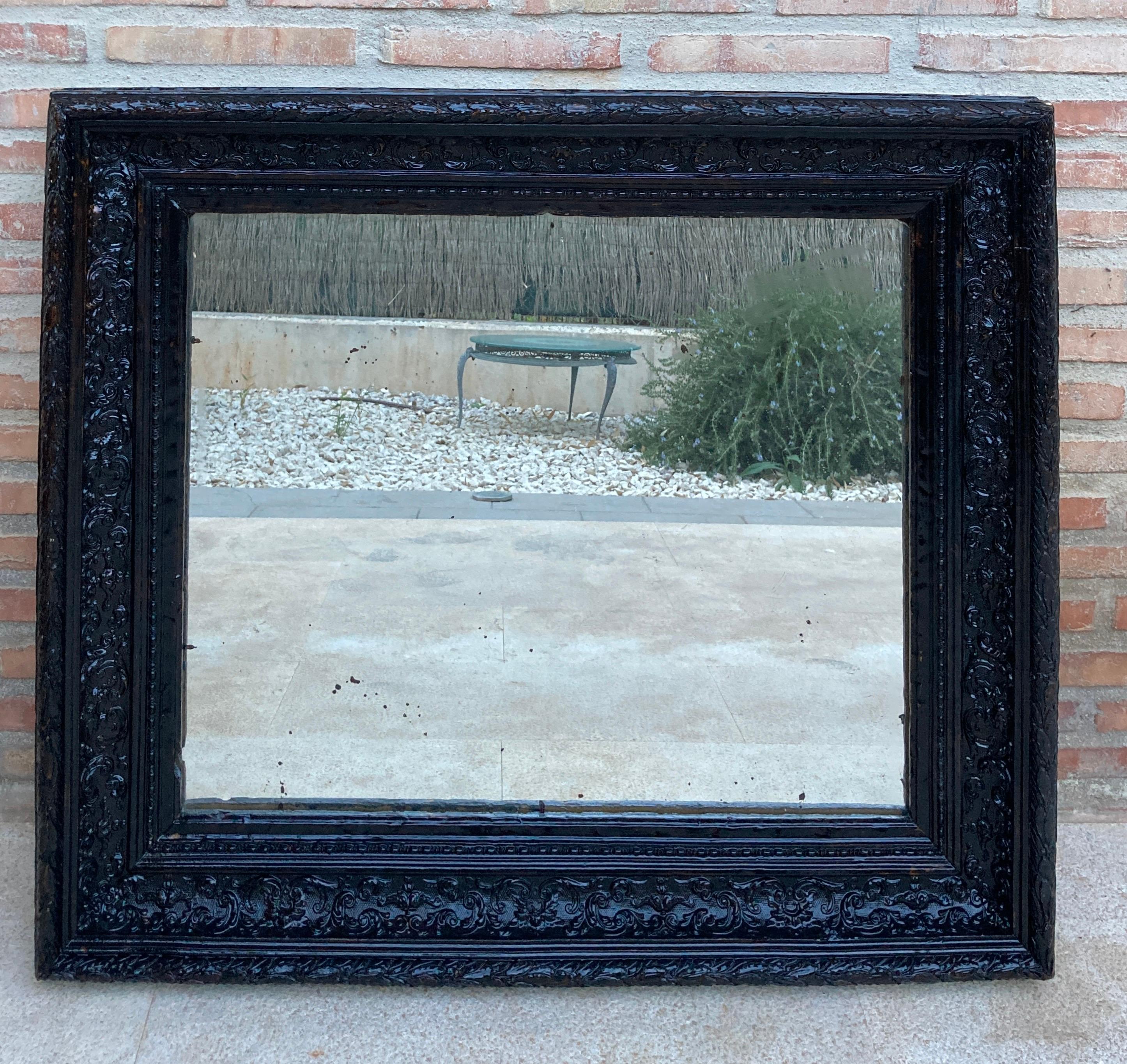 Baroque French Dark Framed Carved Wood Wall Mirror, 1920 For Sale