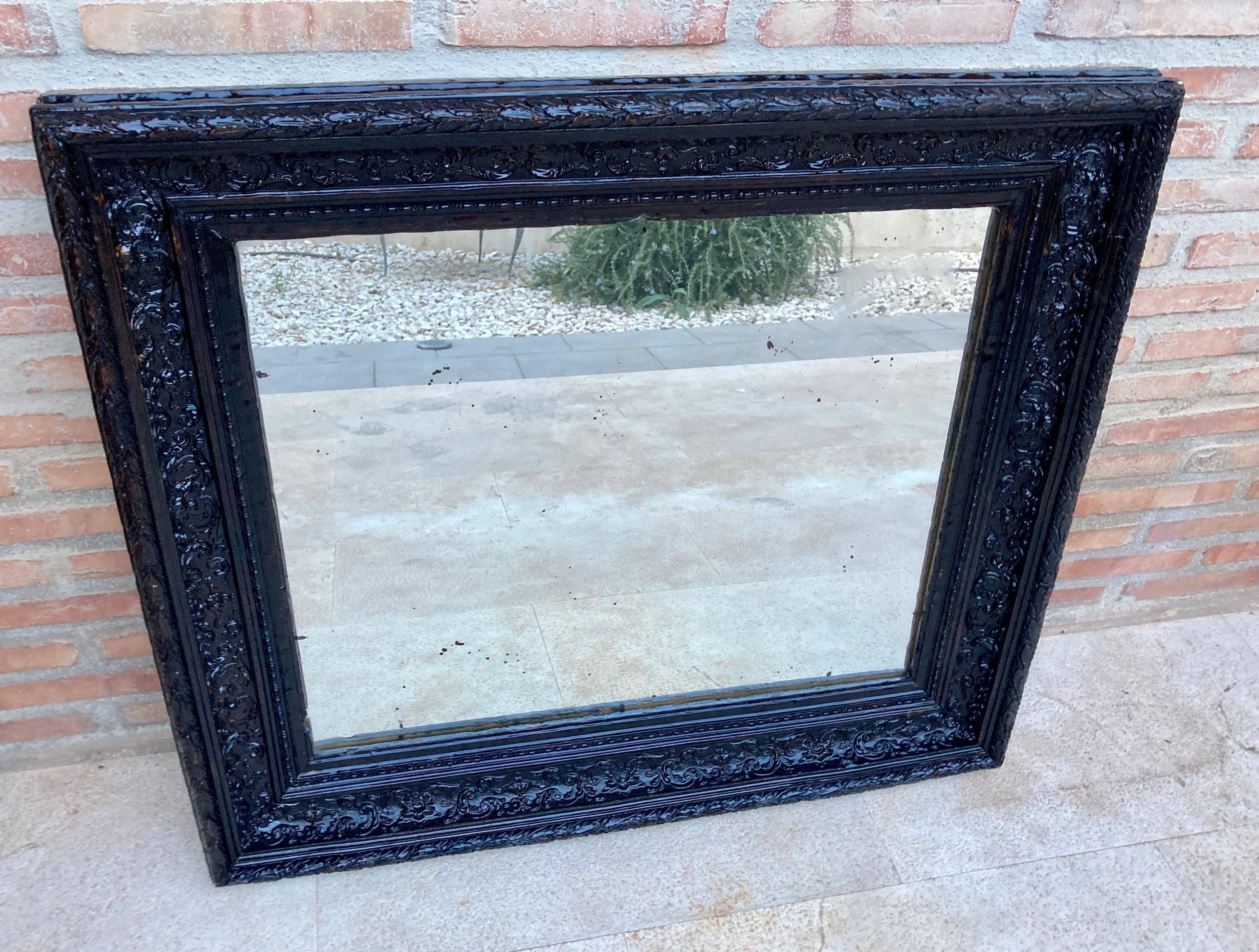 French Dark Framed Carved Wood Wall Mirror, 1920 In Good Condition For Sale In Miami, FL