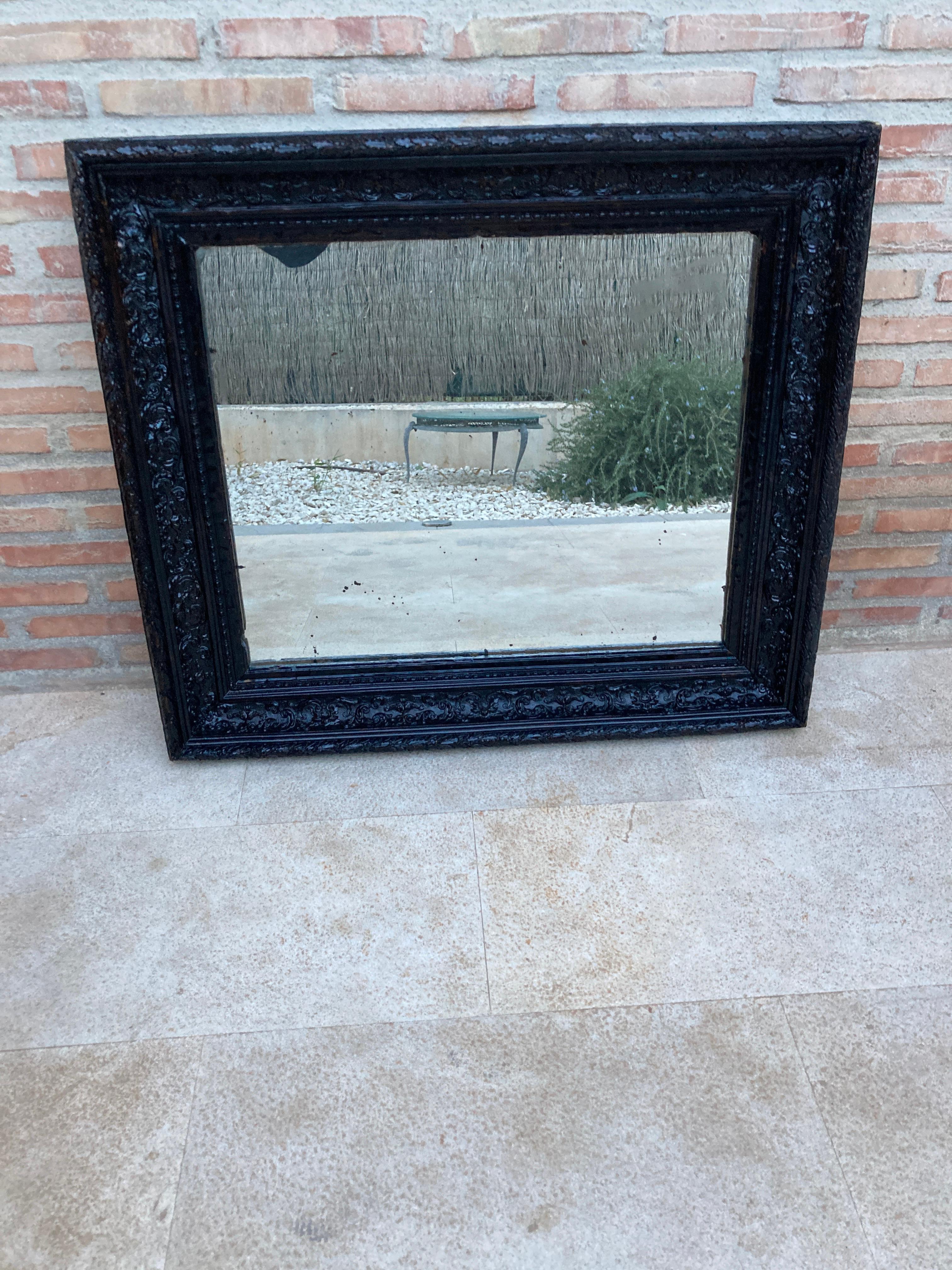 French Dark Framed Carved Wood Wall Mirror, 1920 For Sale 1