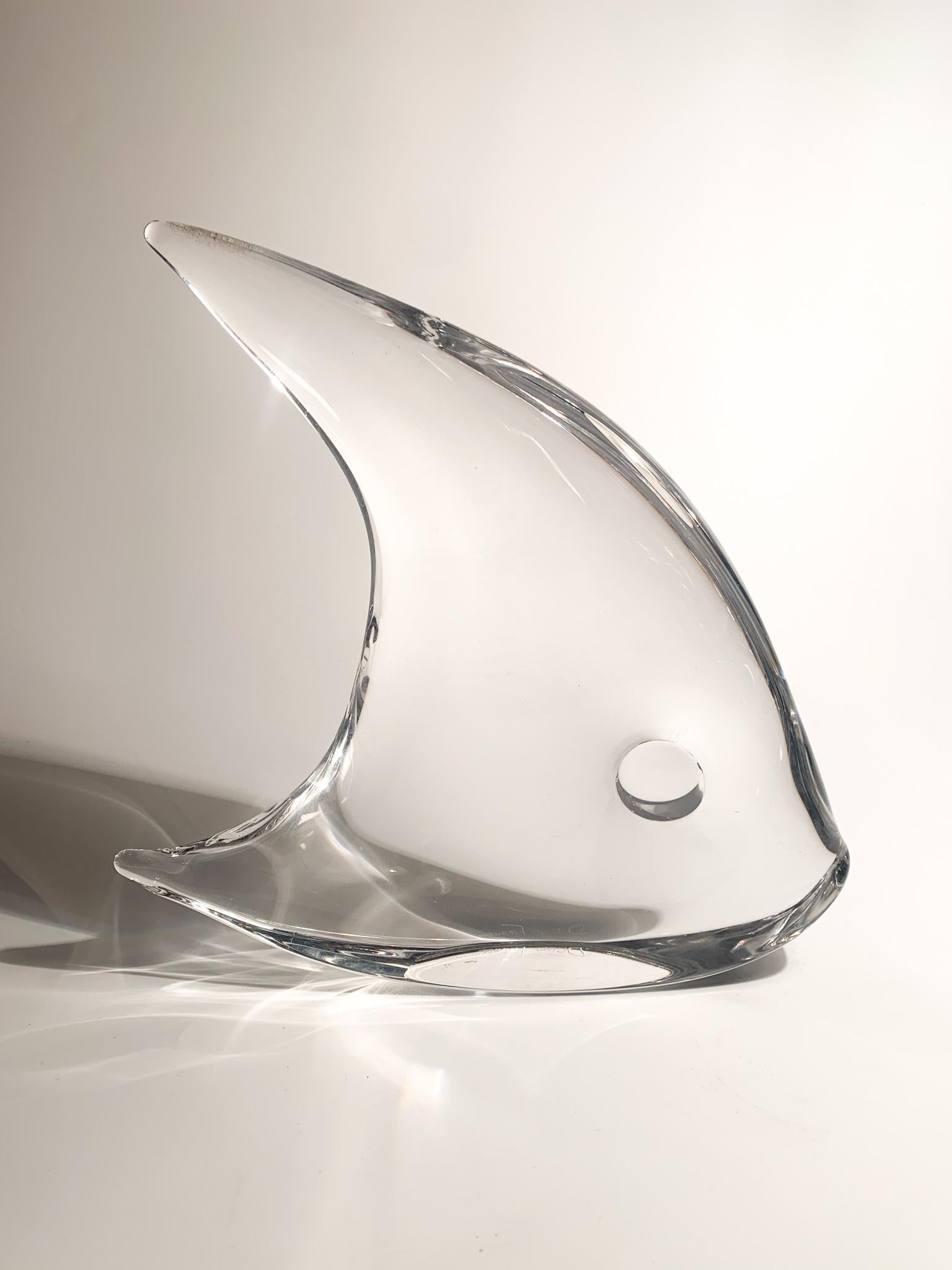 Sculpture depicting a fish in transparent Daum crystal, made in the 1950s

Ø cm 22 Ø cm 5 h cm 22

Daum It is a historic glass factory founded in France in 1878 by Jean Daum. 

From the very beginning he created crystal objects produced with