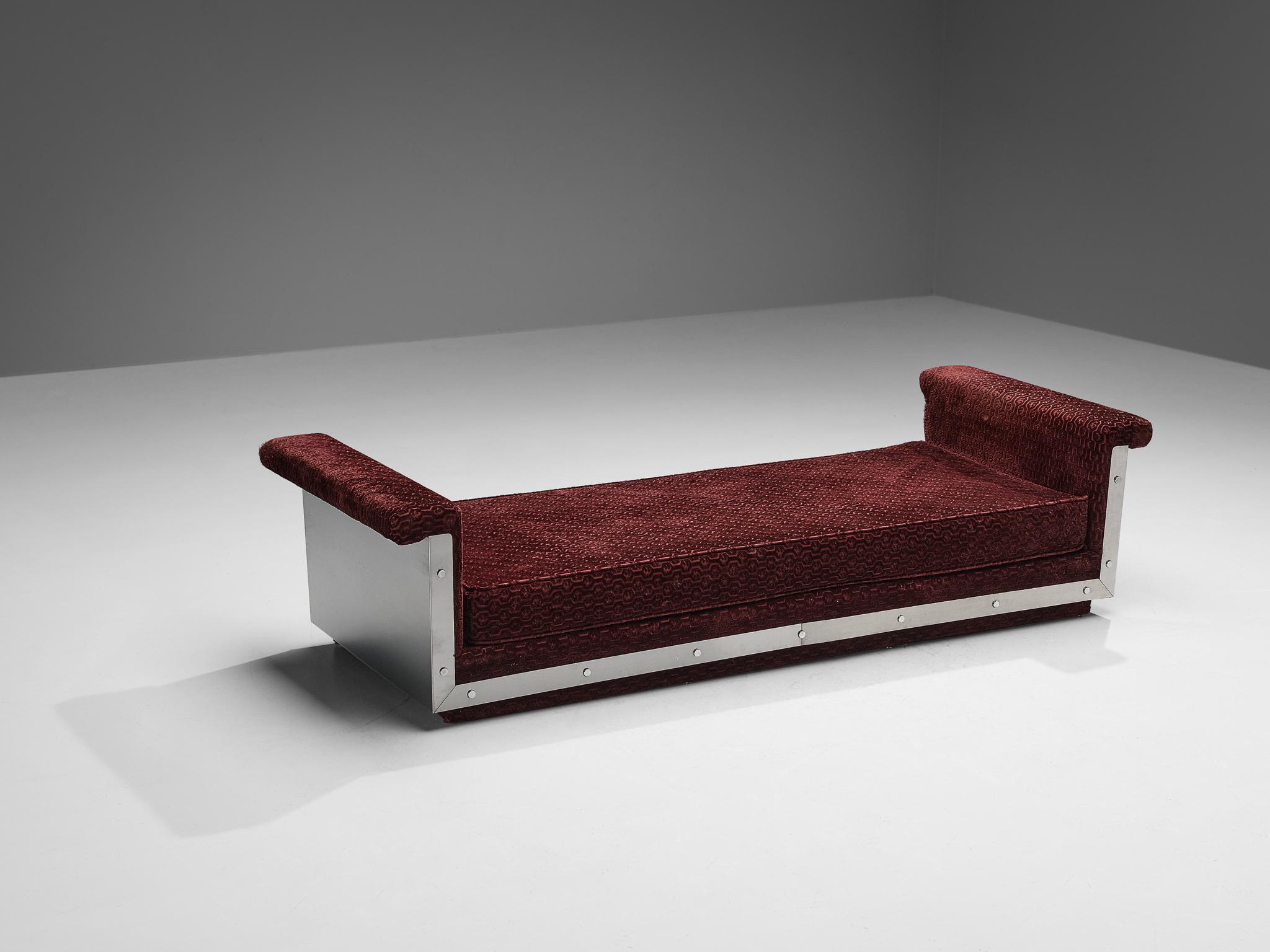 Daybed sofa, stainless steel, fabric, France, late 1960s.

Modern and sleek daybed in stainless steel and velvet patterned upholstery. This design has a very strong expression due to the minimalist shaped steel frame. This Industrial base holds the