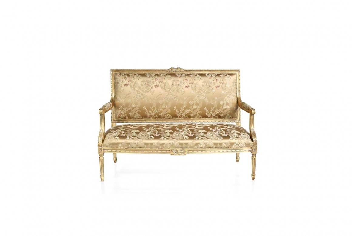A stunning French Deauville Louis XVI sofa, 20th century.

The Deauville is a Louis XVI settee shown in cherry wood with a gold leaf finish. Details in Gold and Silver Leaf on request. Price excludes gold or silver leaf.

Handcrafted in a range