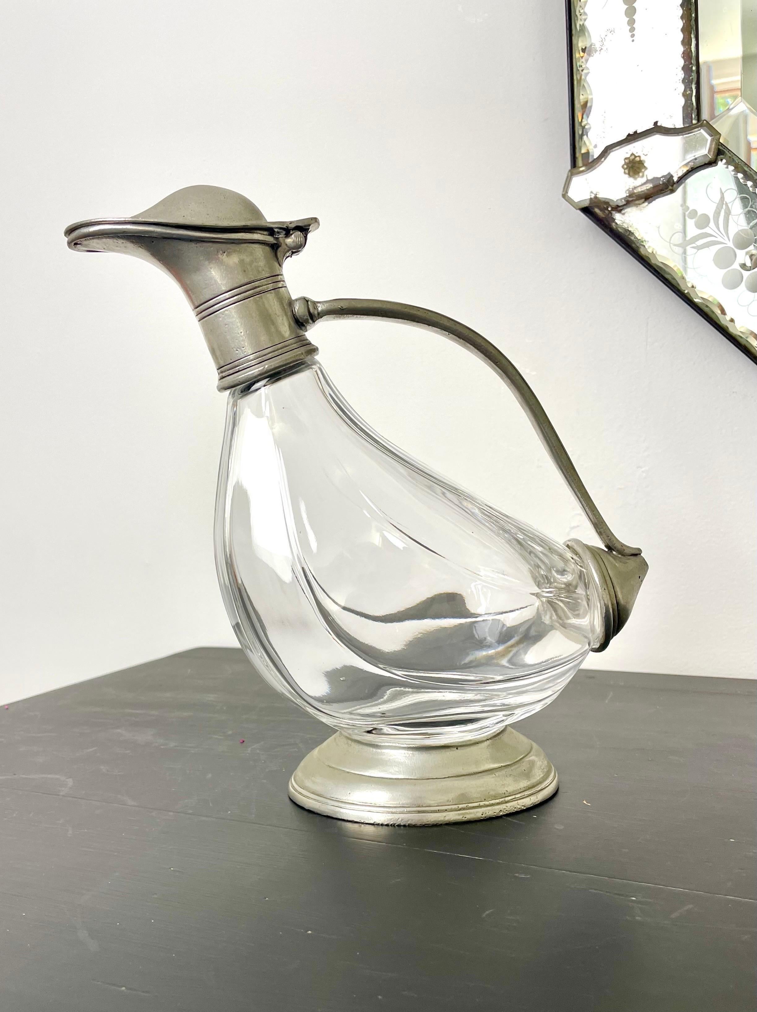 Very beautiful carafe, pitcher, jug, in crystal and engraved pewter.
Nice work of crystal and pewter.
This carafe brings a touch of French elegance to the table decoration.
Ideal for decanting and serving wine or liquor.
The decanter is in the shape