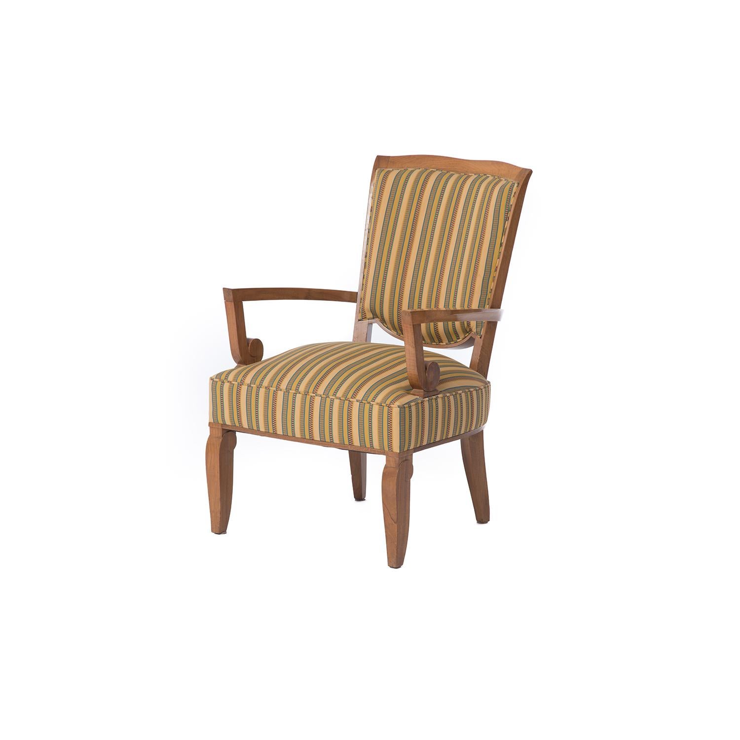 French Art Deco armchair in Cuban mahogany designed by Jules Leleu. Frame is in very good vintage condition, clear lacquer finish shows some signs of use but is in acceptable and useable condition. Fabric is in good condition but does have two small