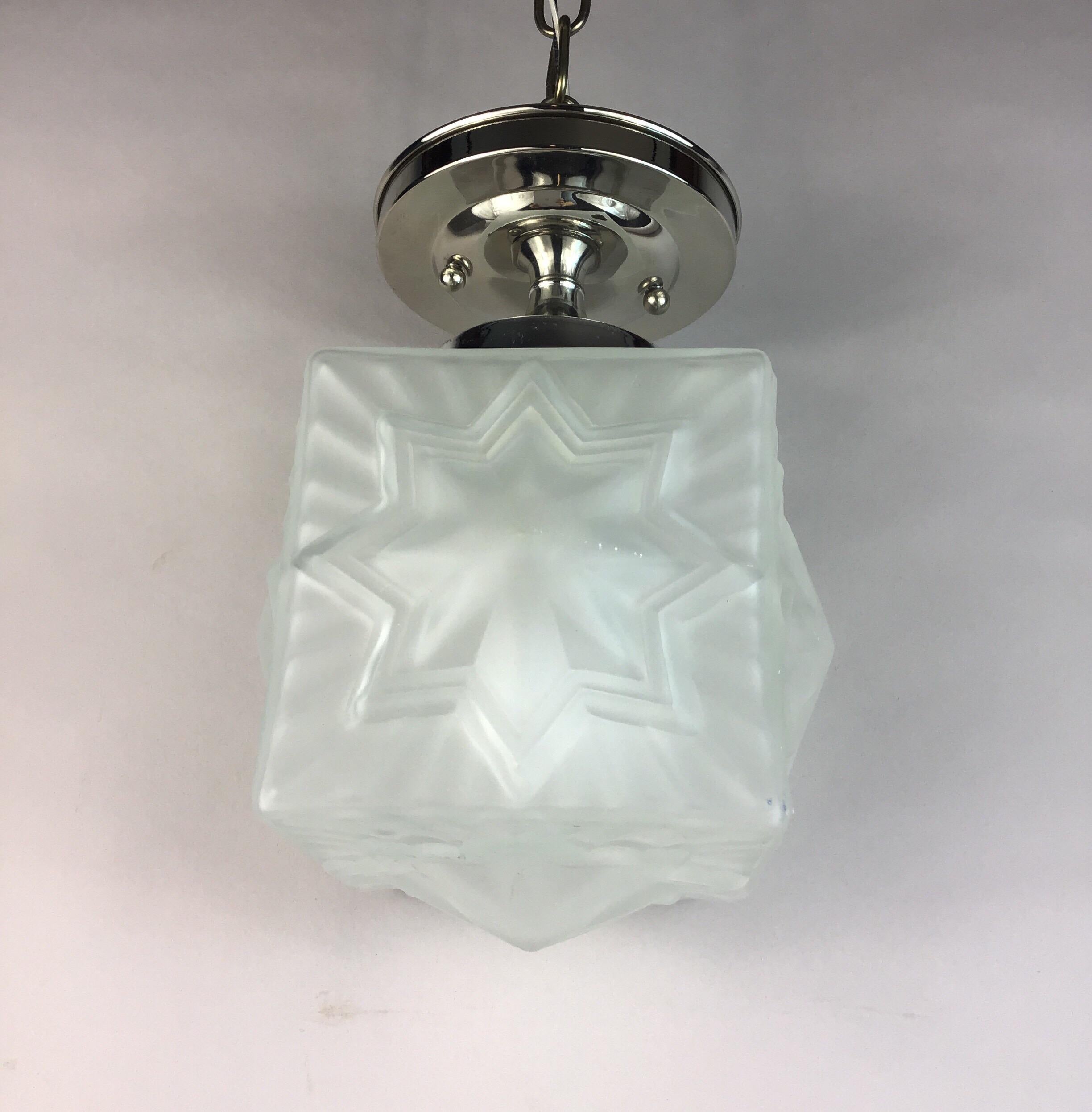 1-3059abc Frosted French star flushmount.
Takes one 100 watt Edison based bulb
3 available.Priced individually