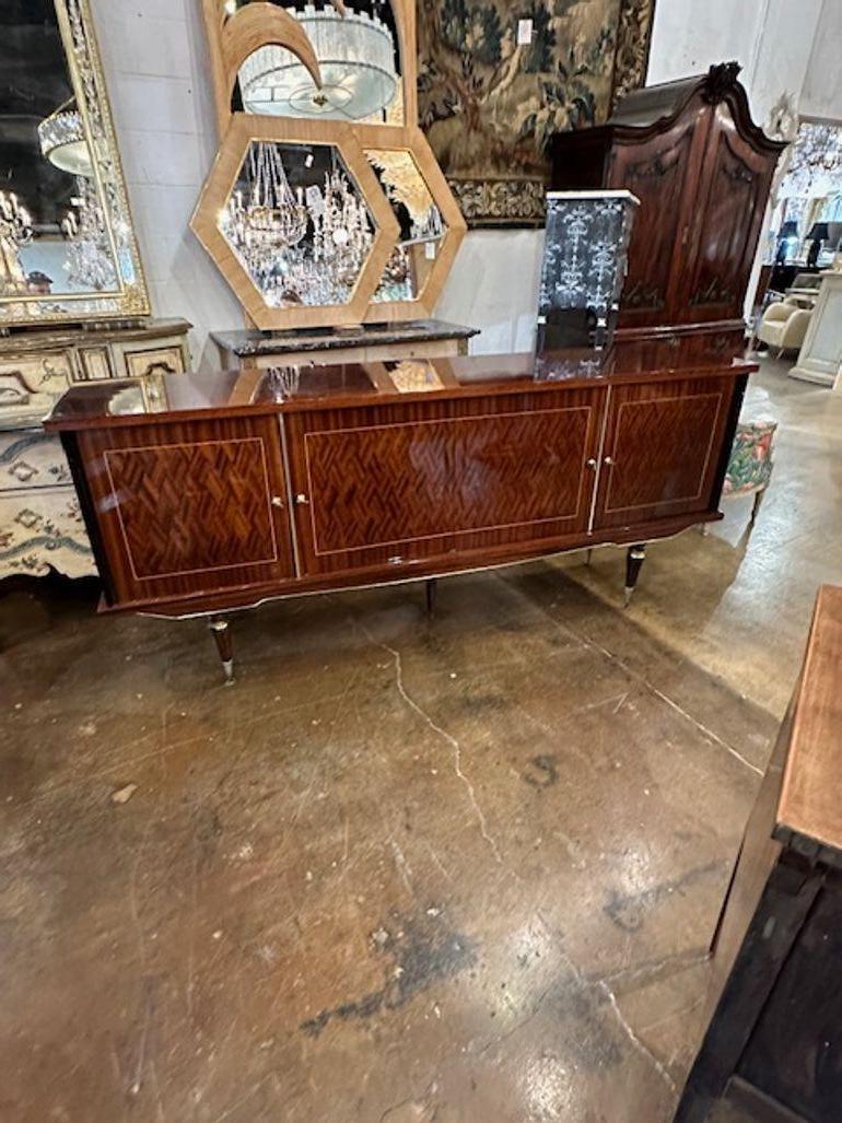 Exceptional vintage French inlaid mahogany and brass Deco design sideboard. Circa 1940. Perfect for today's transitional designs