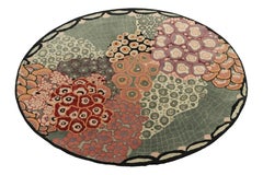 Alfombra circular estilo Deco francés con motivos abstractos multicolor by Rug & Kilim